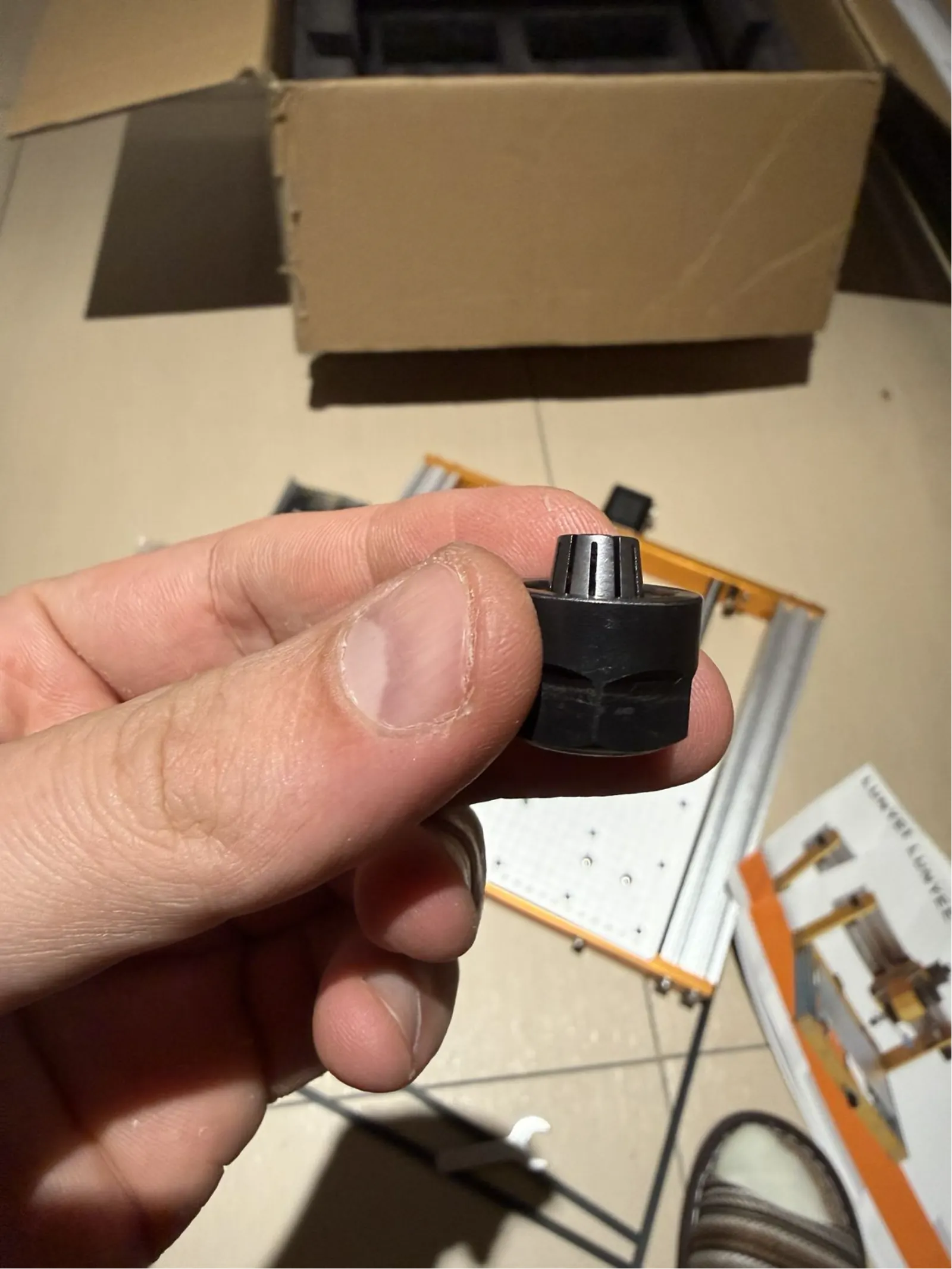 ER11A collet clamping nut included with the kit – this holds the router bit in the spindle