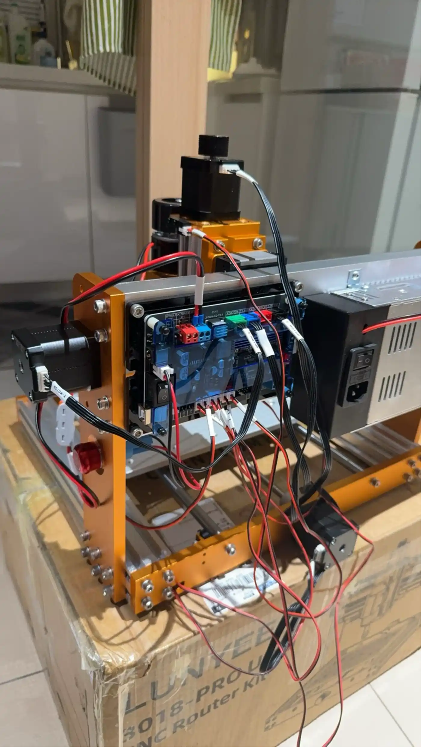 Desktop CNC with all wiring connected – GRBL controller board, stepper drivers, and power supply installed