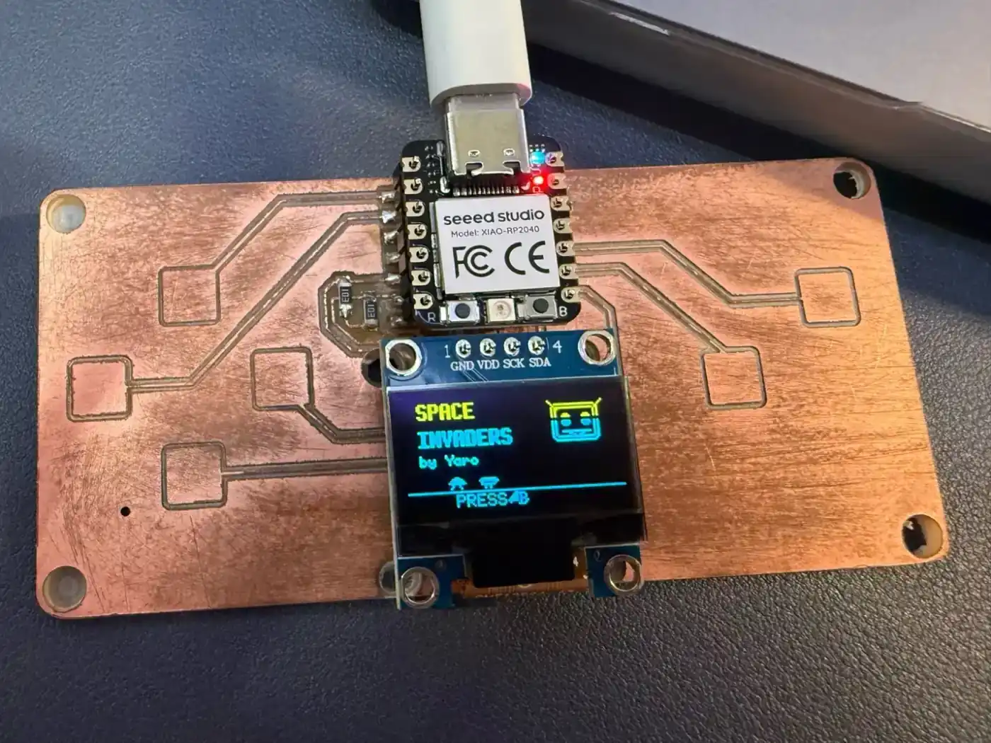 Space Invaders style game running on the OLED display
