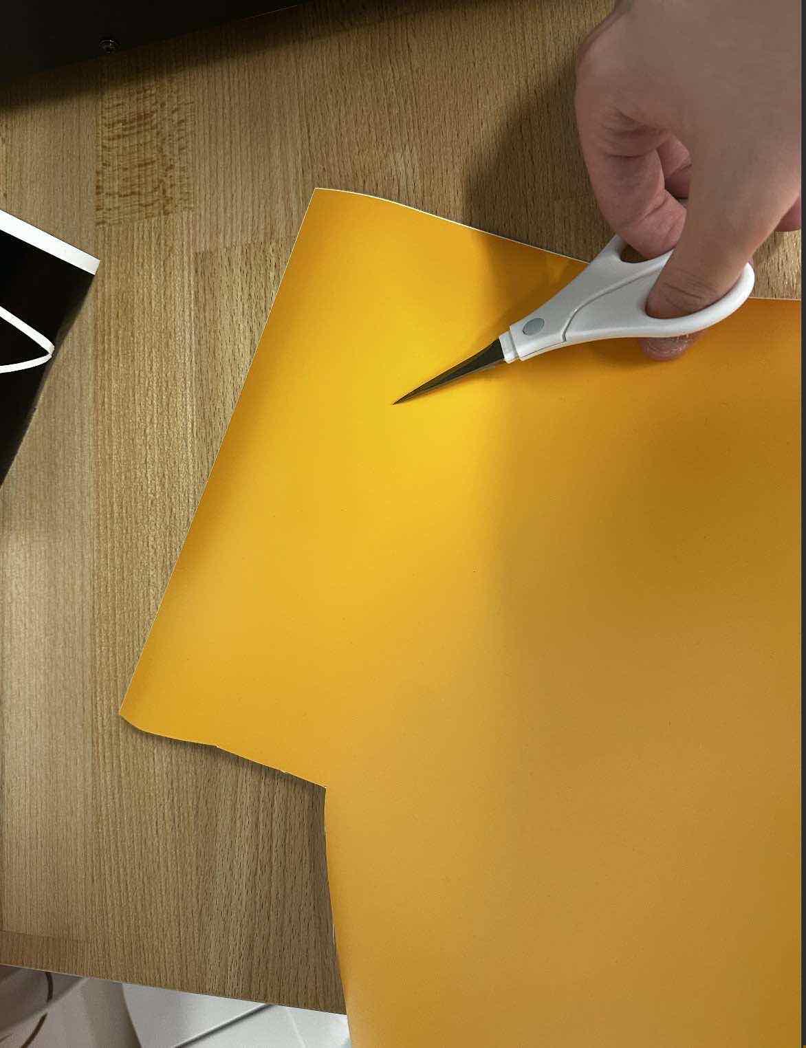 Cutting yellow sheet