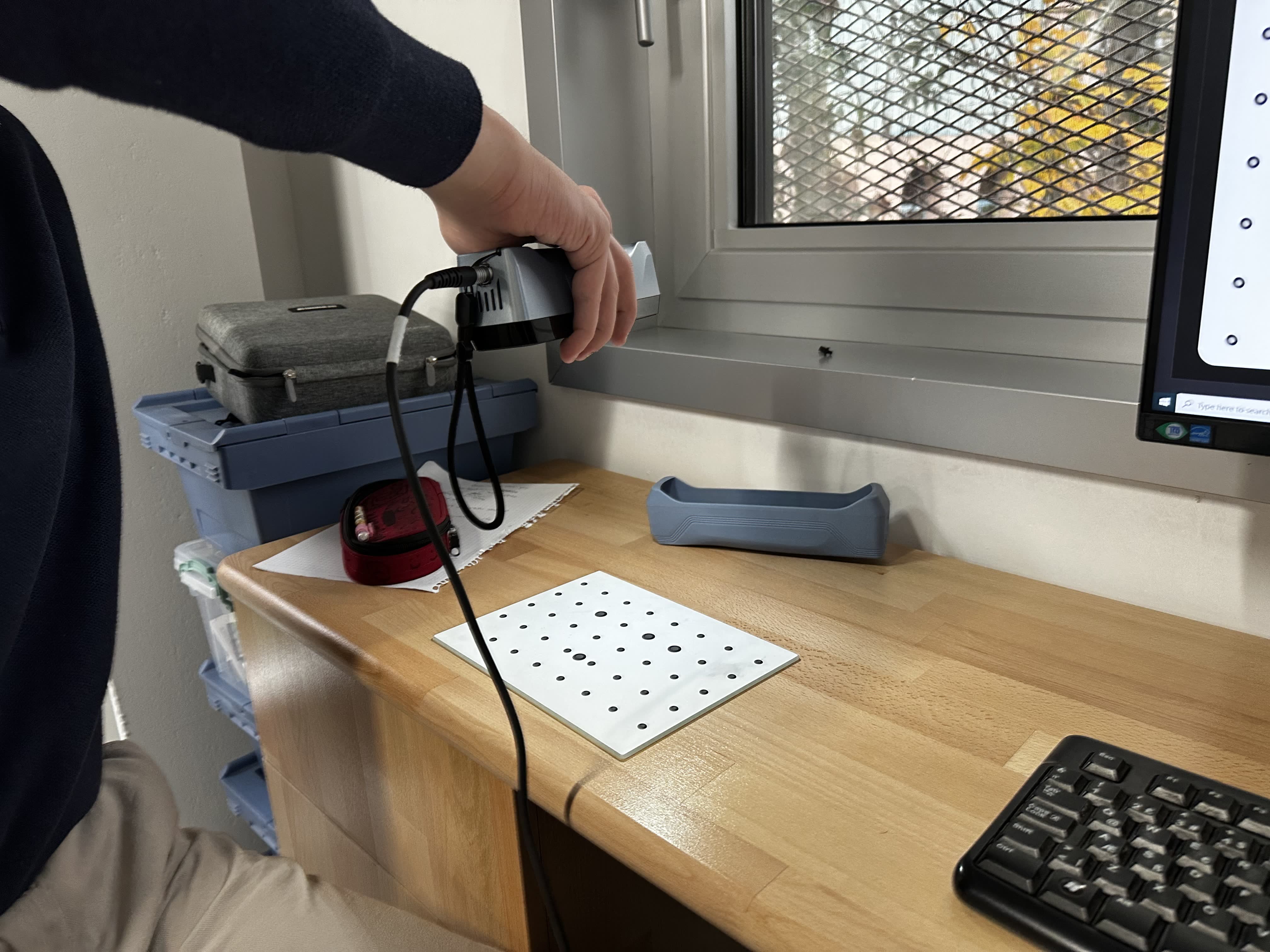 Scanner over calibration sheet