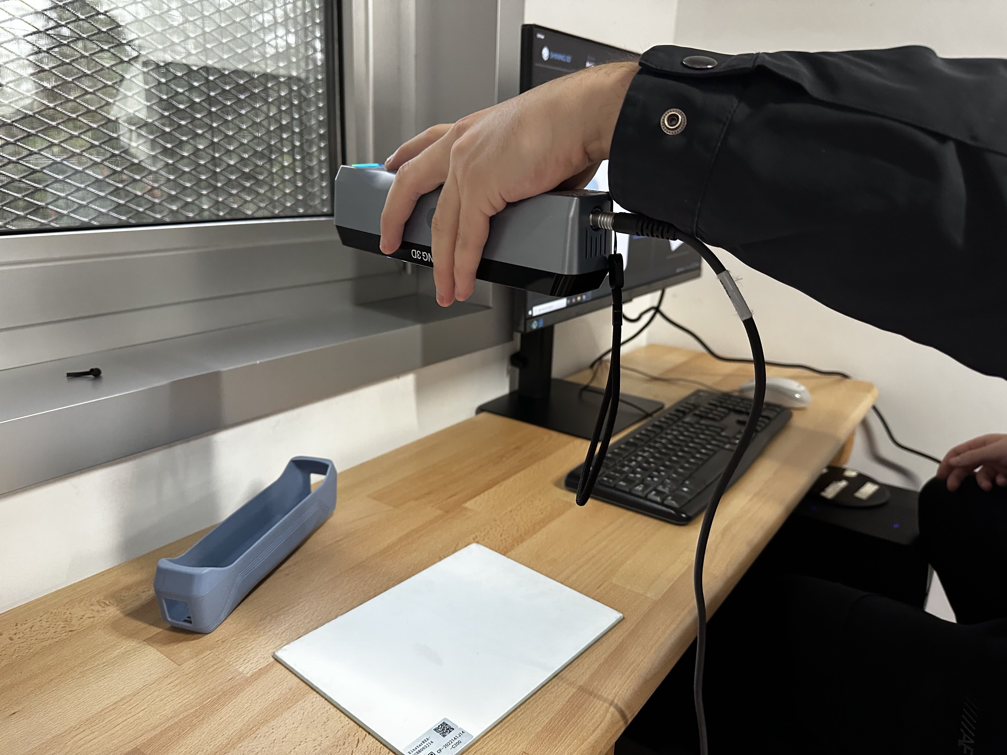 Workstation with scanner, calibration card, and holder