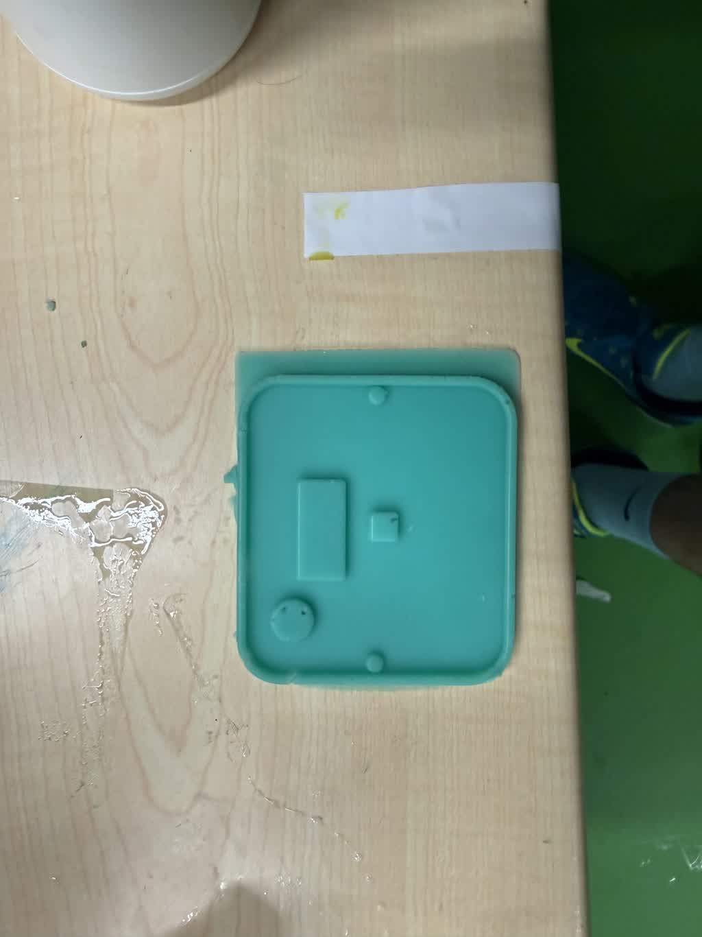Feyncorder top silicone mold — window, pad recess, and encoder pocket with alignment bosses