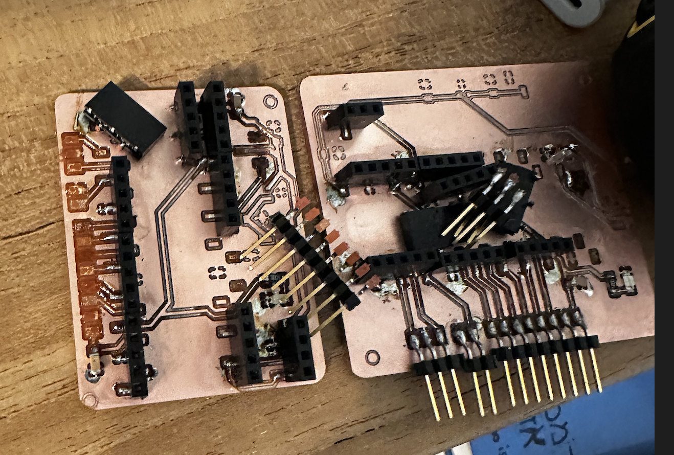 Milled copper prototypes — main board and submodule breakout after CNC routing