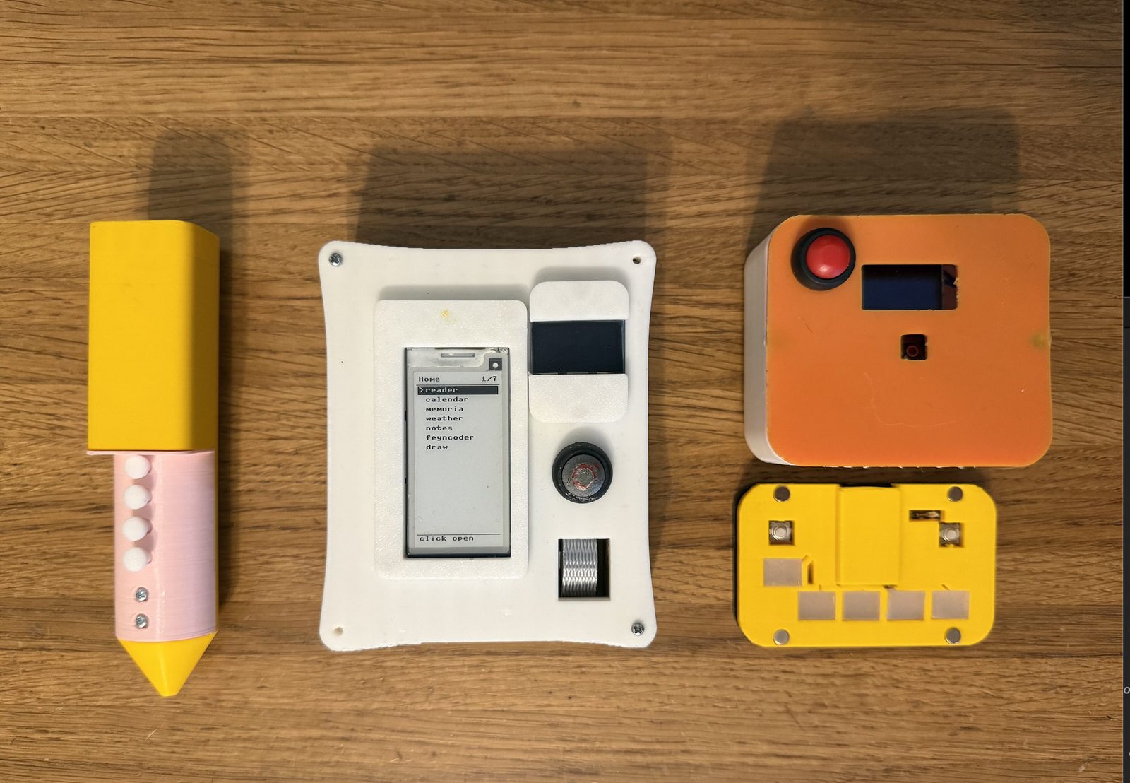 Full hardware lineup — white Pockety with reader menu, gyro-stylus, ChordBoard, and draw module