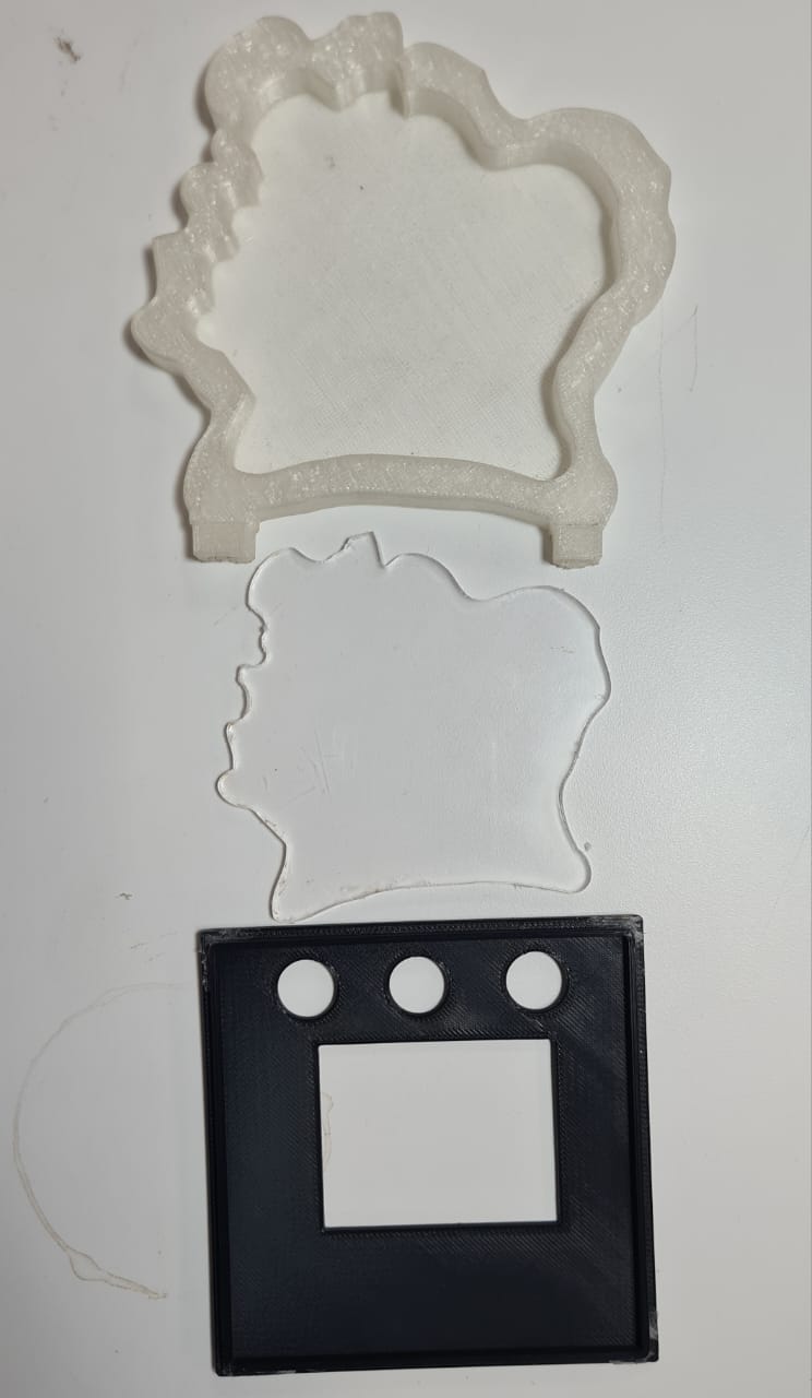 Inserting the PCB into the acrylic silhouette