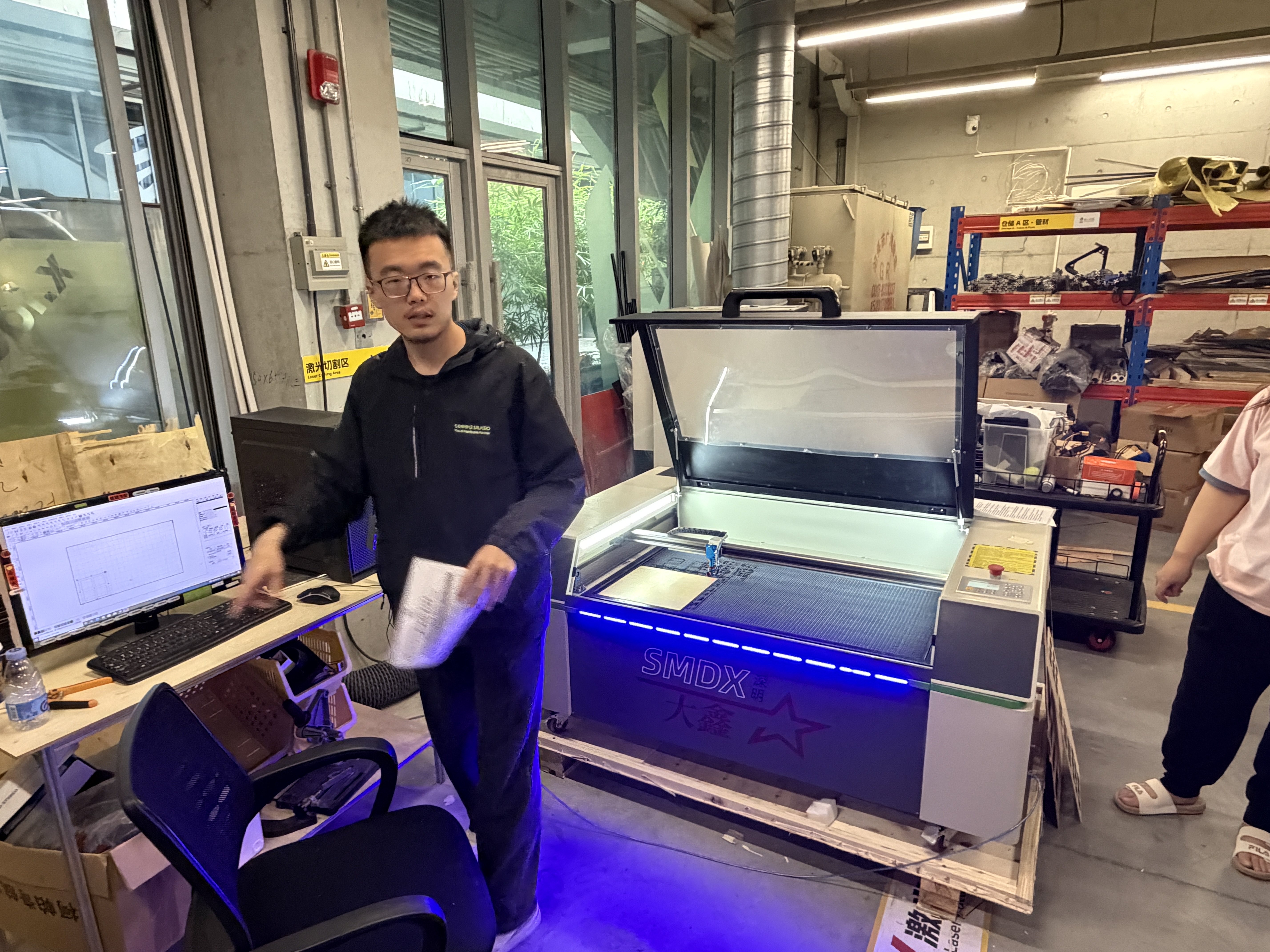 Plywood stock placed and aligned on the laser work area