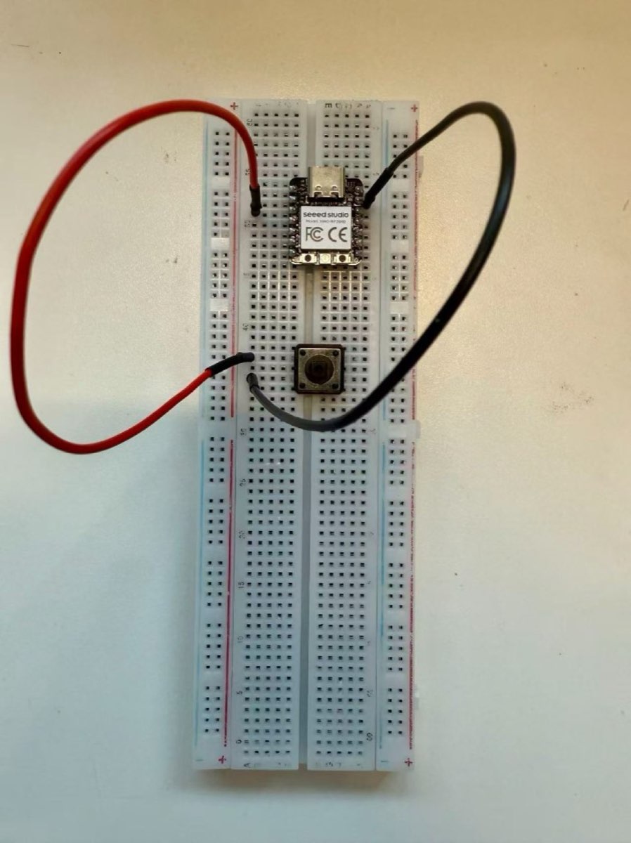 Breadboard wiring between XIAO RP2040, push button, and ground