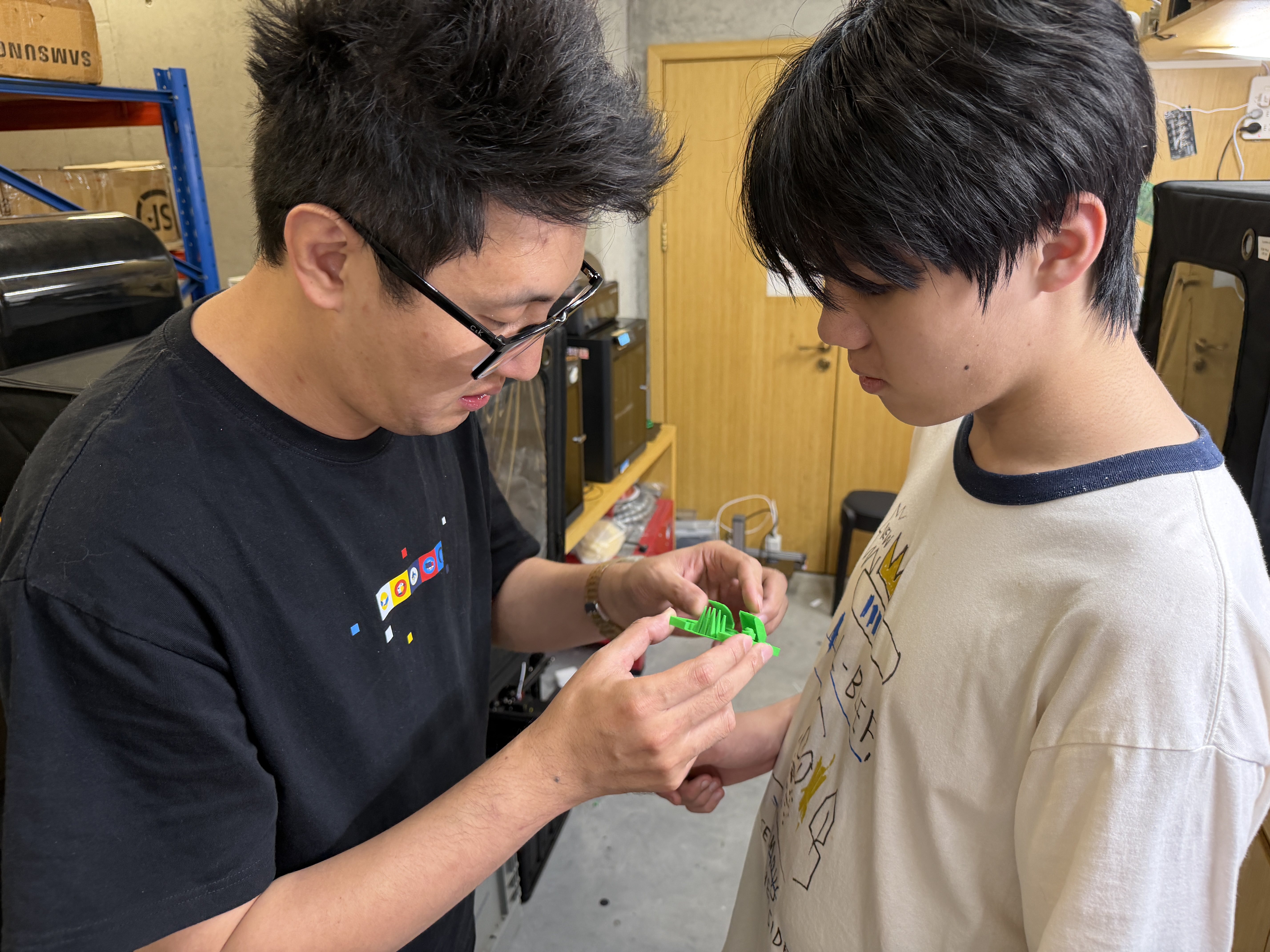 Inspecting 3D-printed design-rules test coupons on the build plate