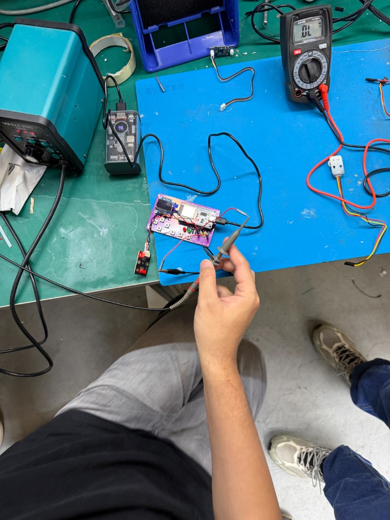 Scope probe on purple PCB test point