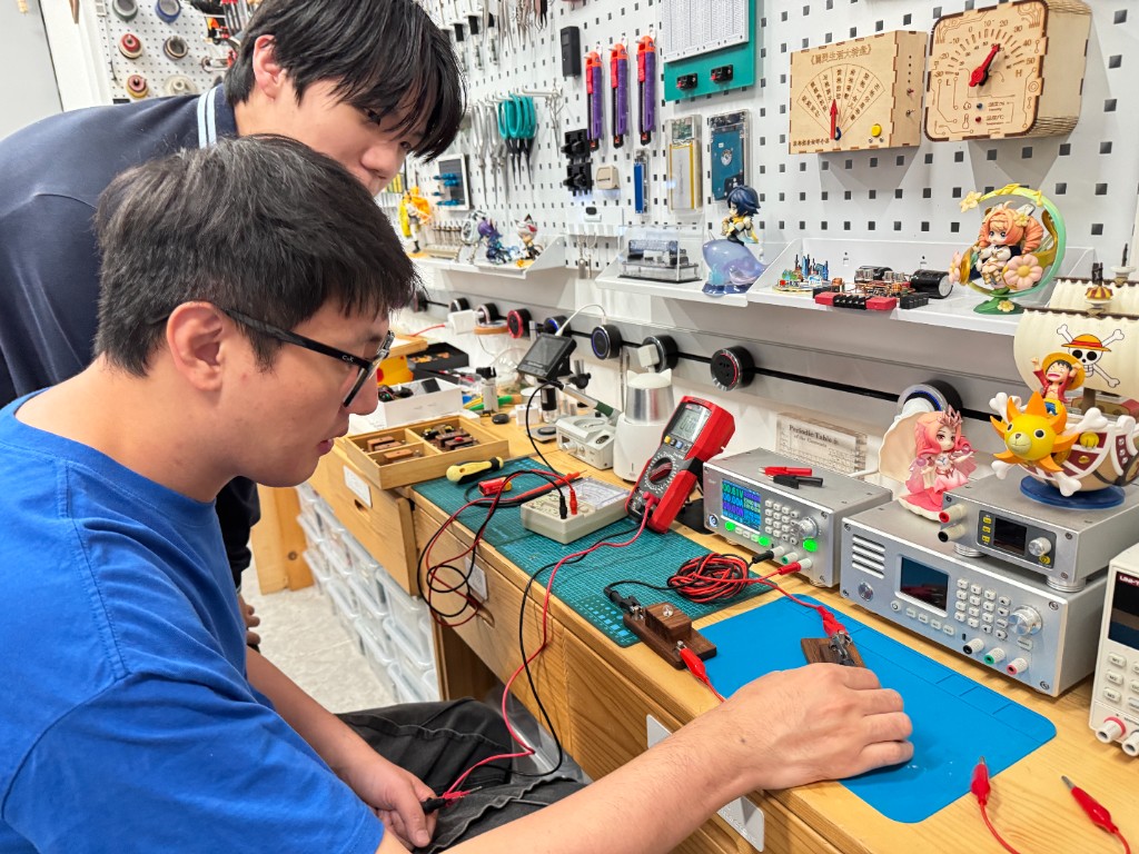 Bench setup overview with supply meter and fixture