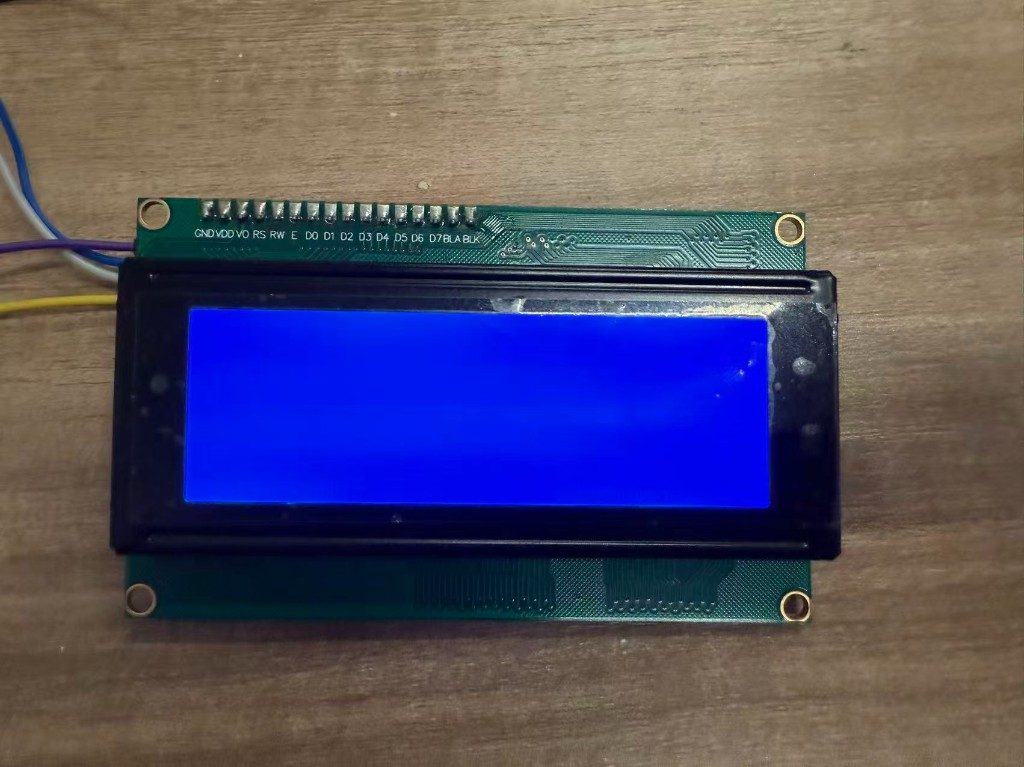 LCD showing blank blue backlight before contrast adjustment