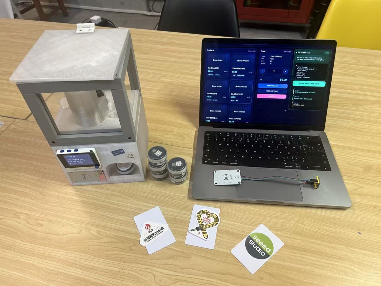 Full vending machine setup with workstation and laptop