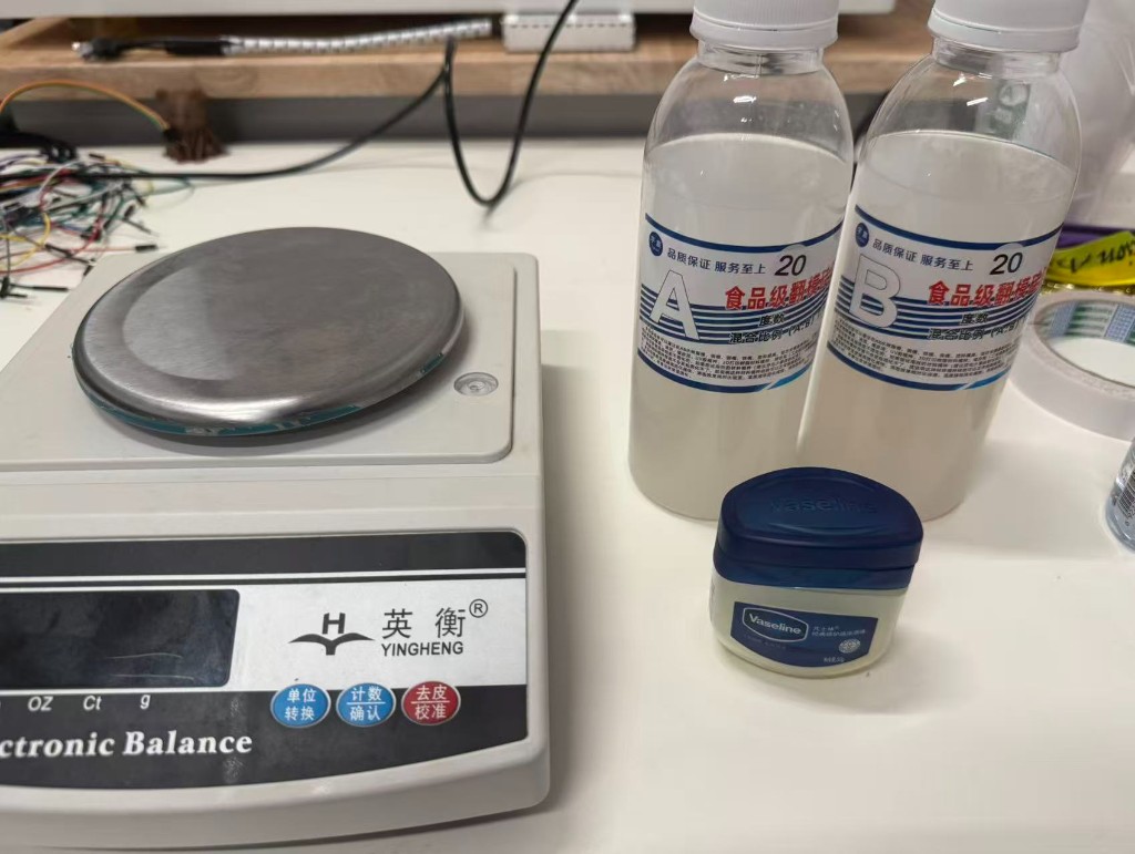 Silicone A and B bottles and scale