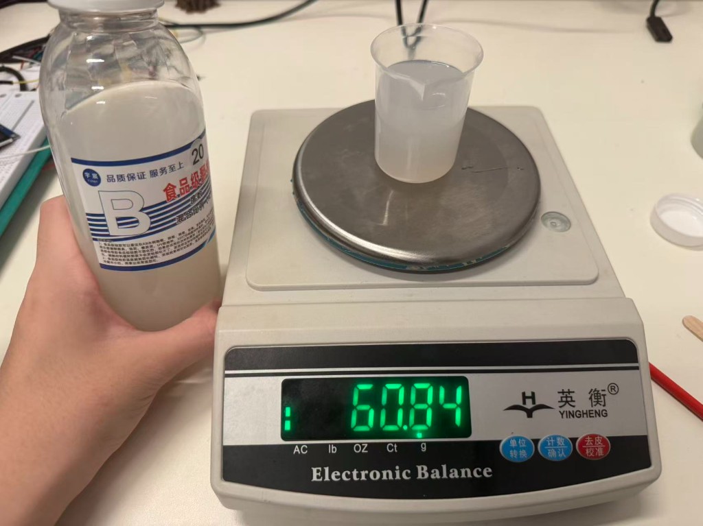Weighing silicone part B to match part A