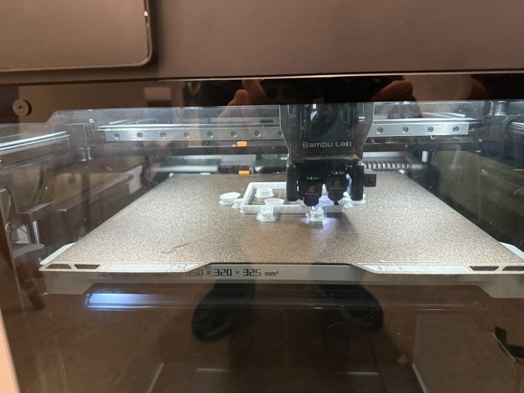 Version 1 print in progress on the Bambu Lab printer