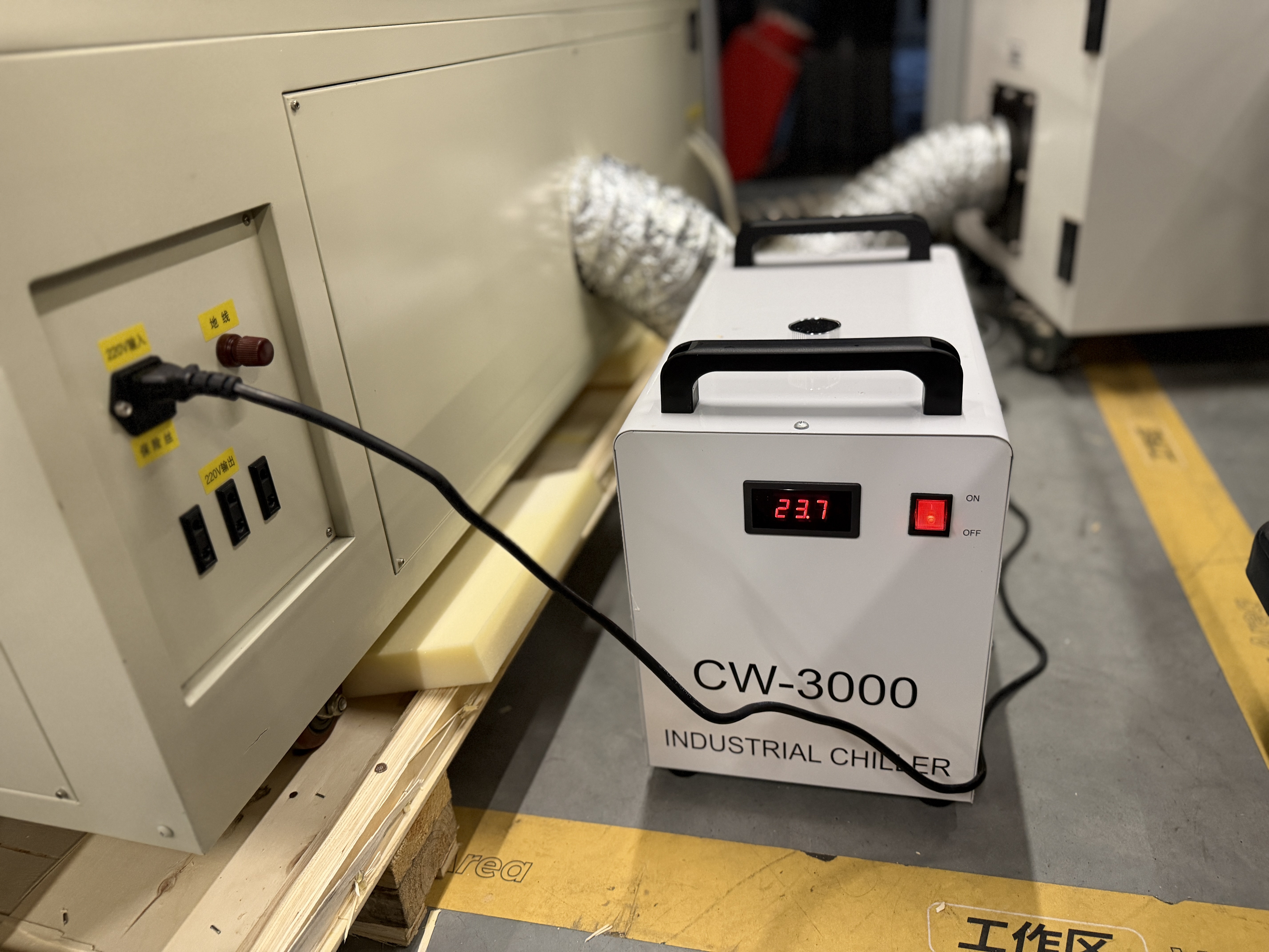 Laser machine powered on at the bench