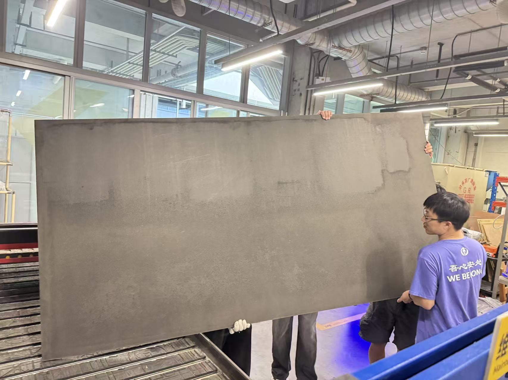 Placing the wood workpiece on the CNC table