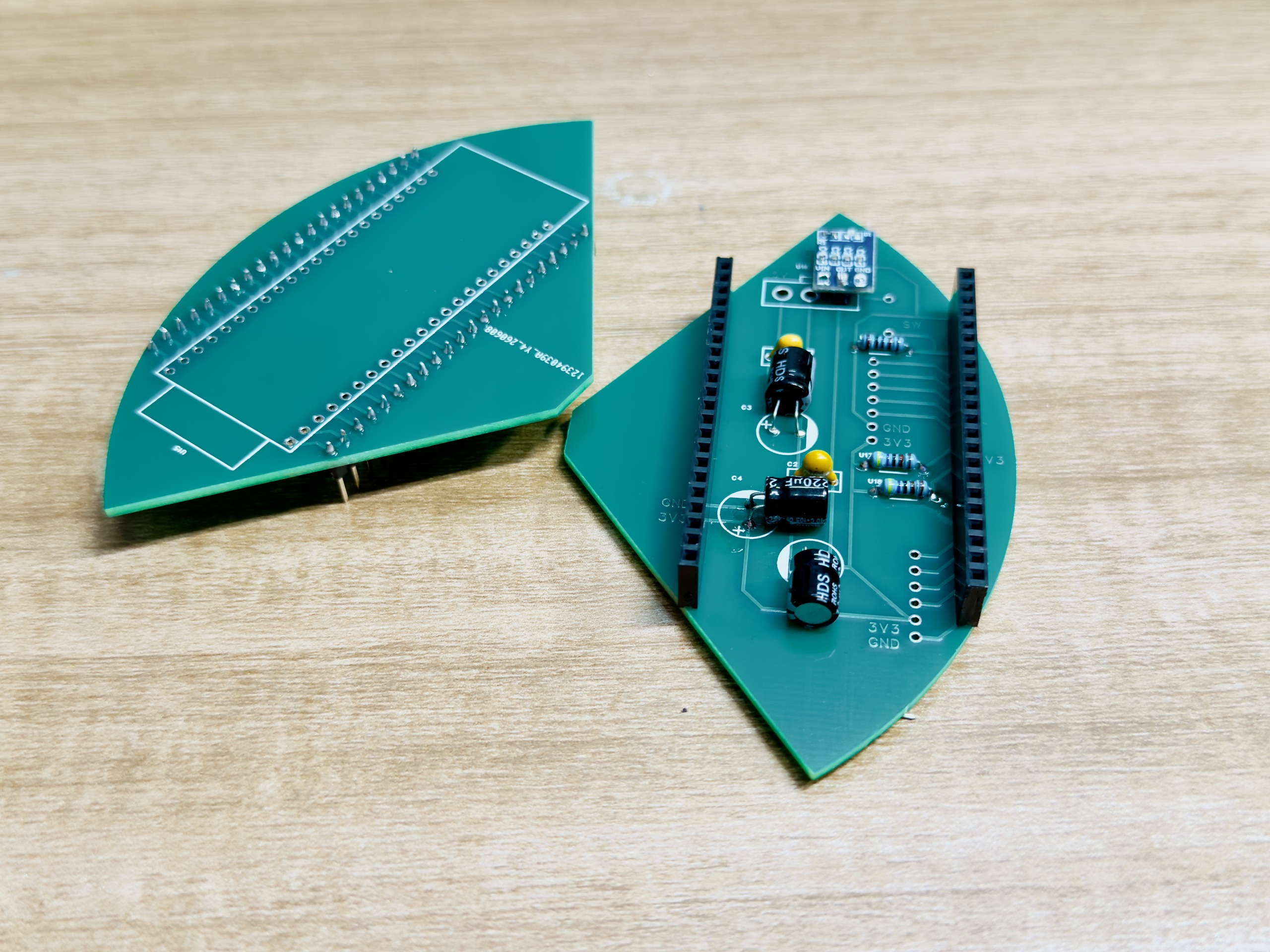 Bench soldering session on the chassis carrier PCB