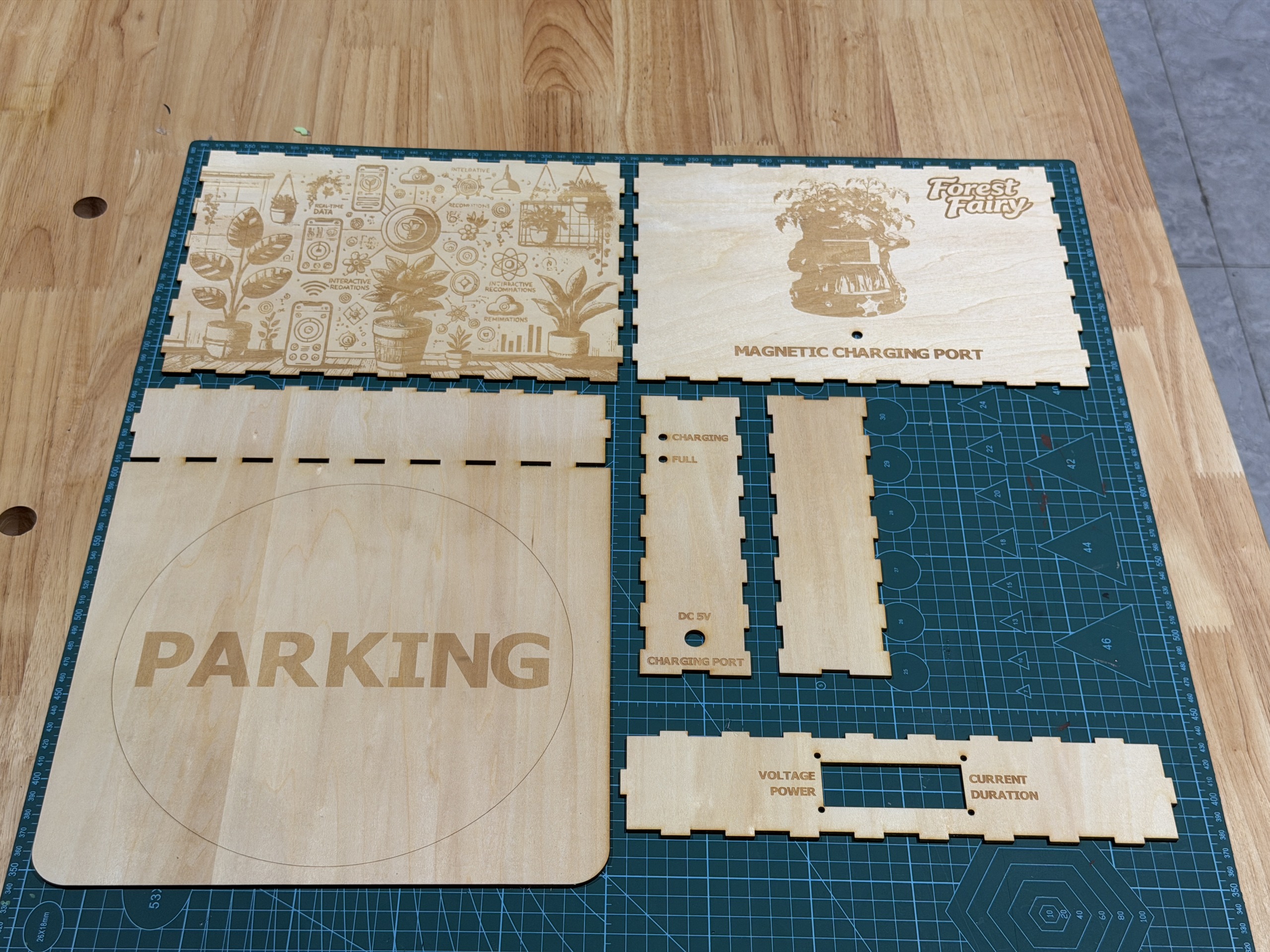 Laser-cut dock parts with teal spray-paint finish