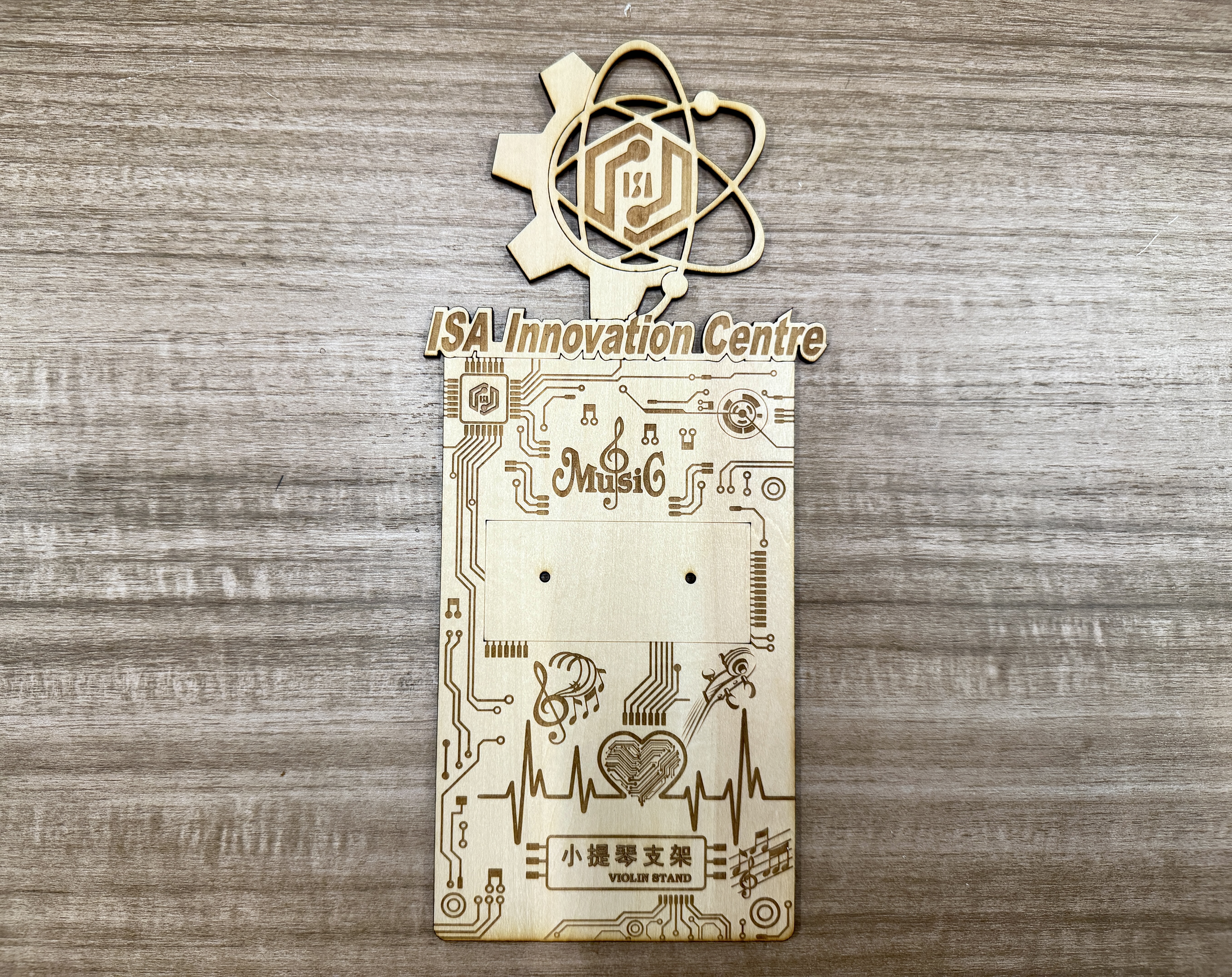 Flat laser-cut pieces of the violin stand