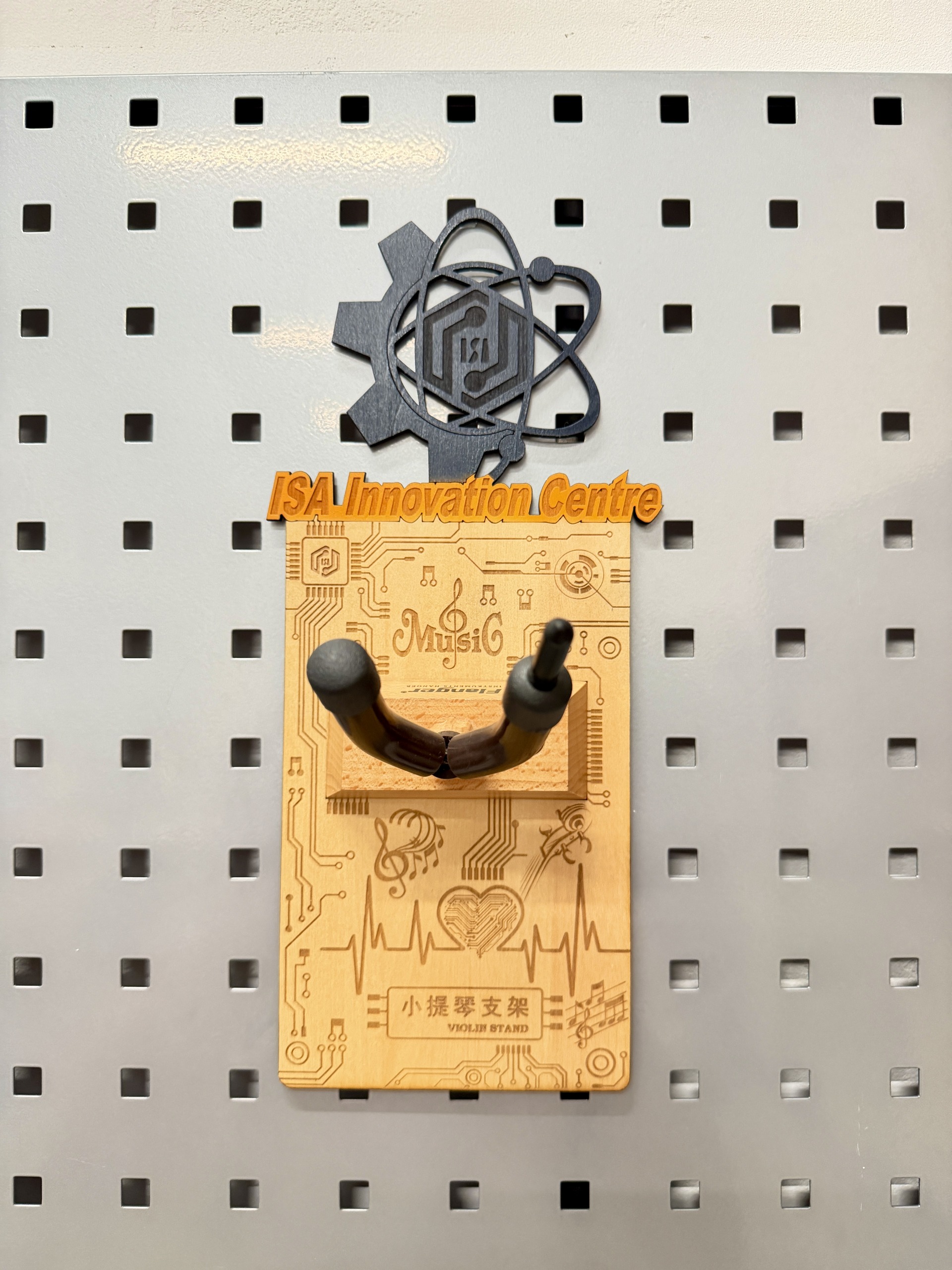 Metal support bracket installed to laser-cut wooden panel
