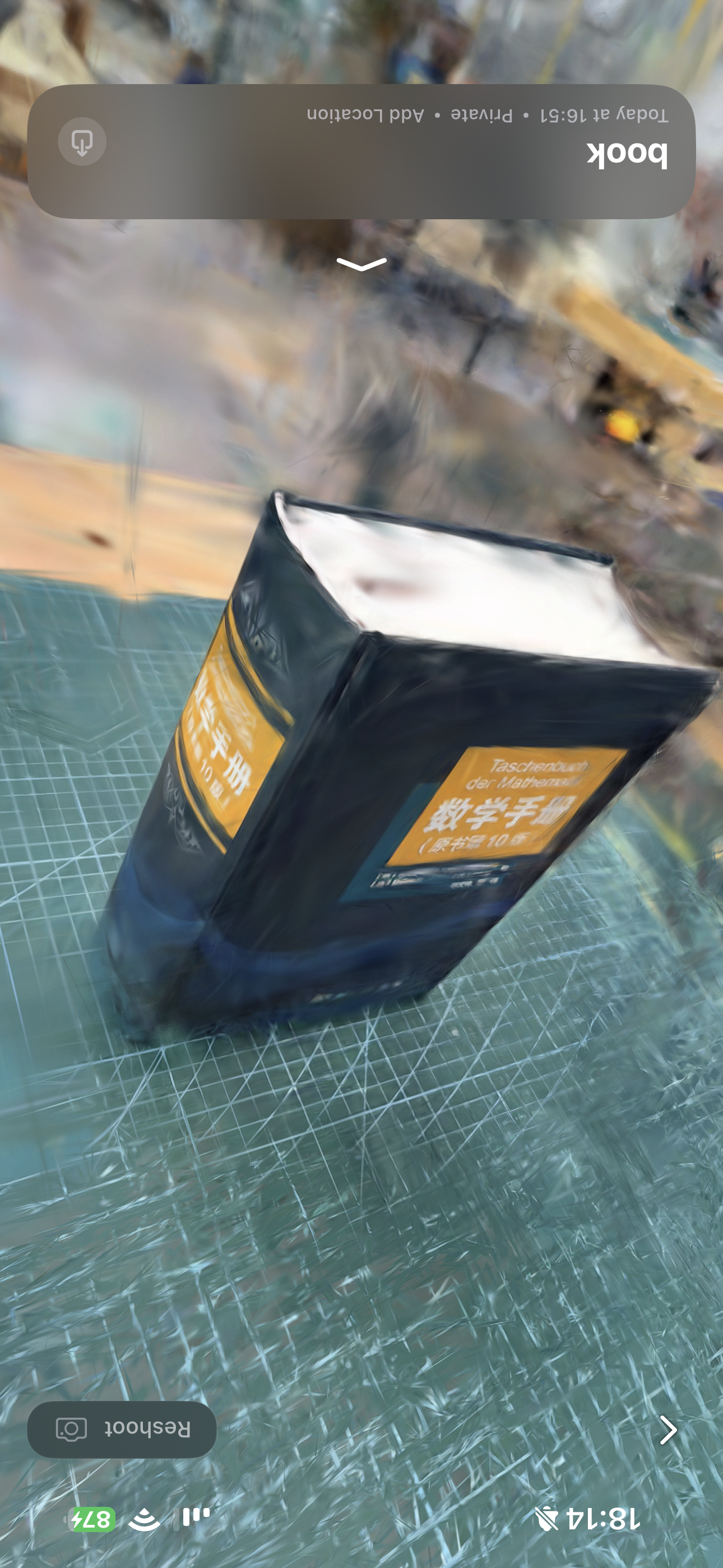 Luma 3D reconstructed result showing a textured digital book model in the scanned scene