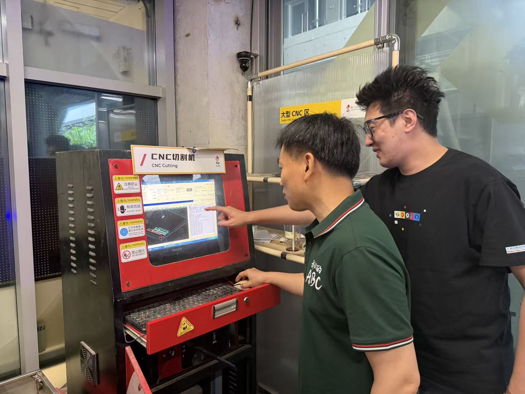 Operator confirming Z height and parameters at the CNC controller