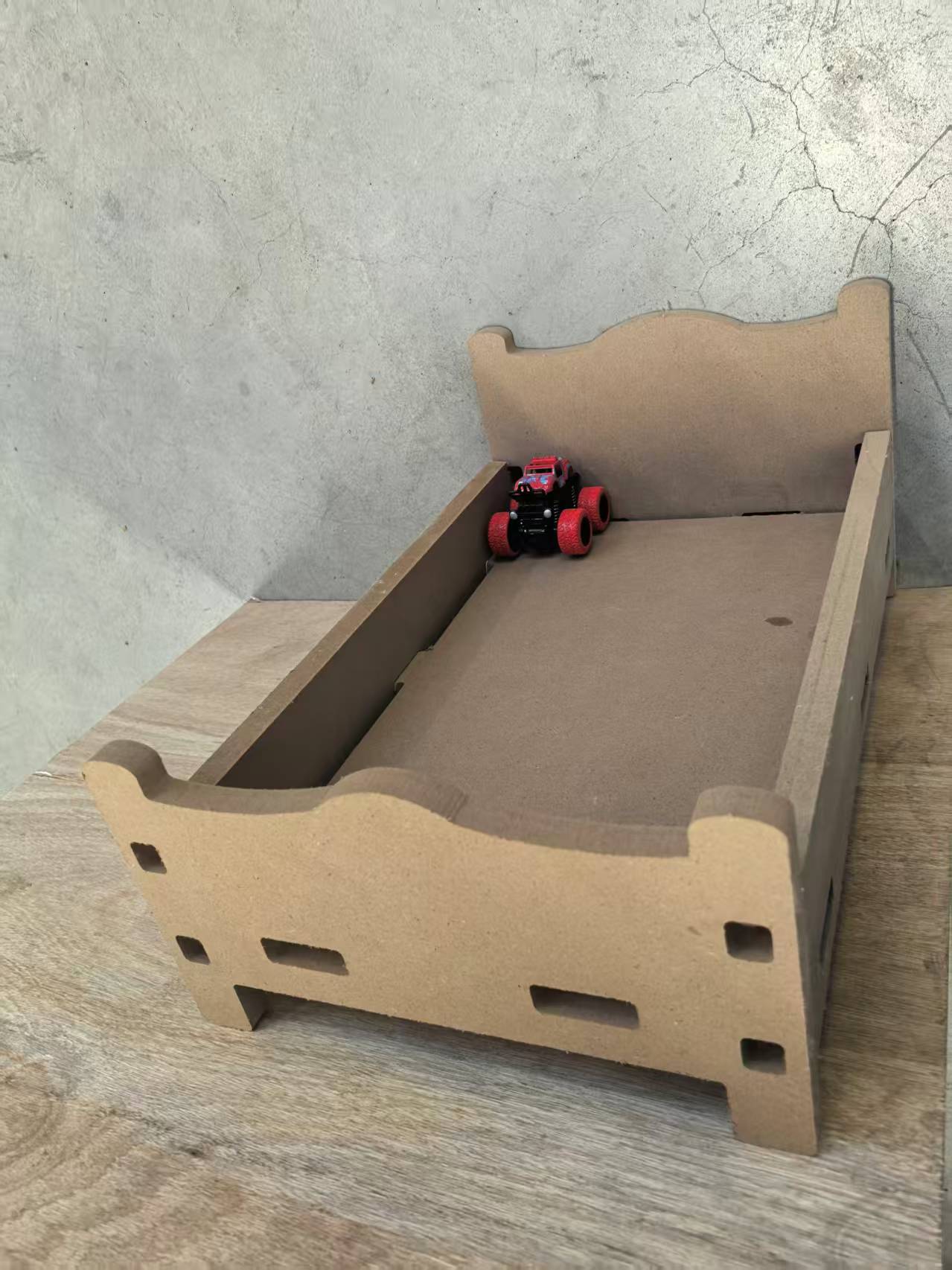 Assembled little dog bed — hero shot with curved headboard and footboard