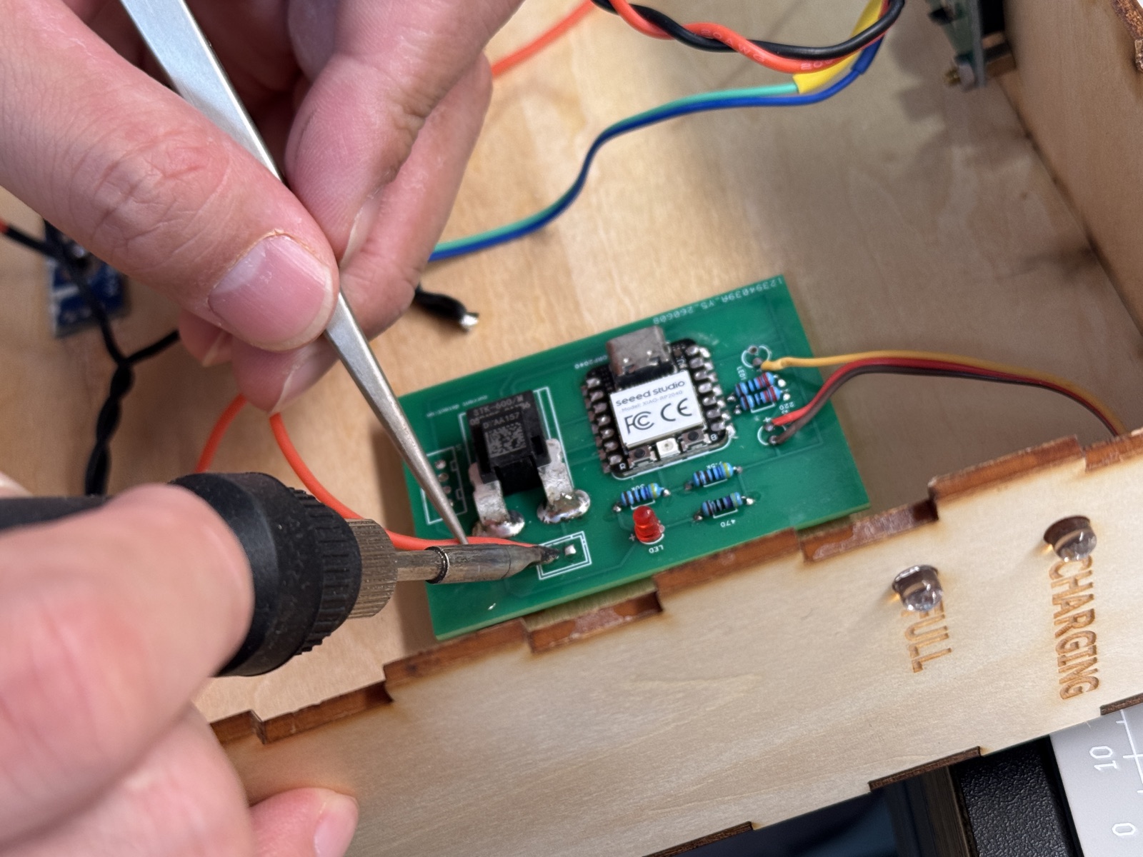 Soldering resistors and LEDs on the charging dock PCB
