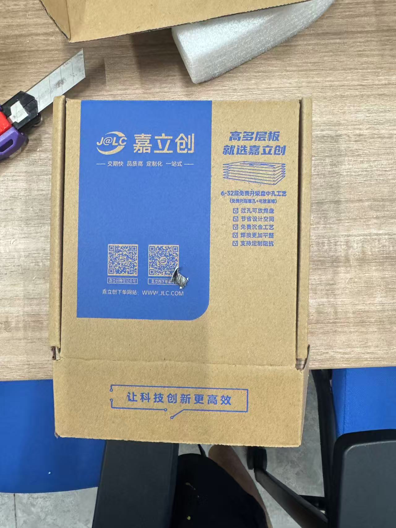 Received PCBs from JLCPCB showing both design revisions