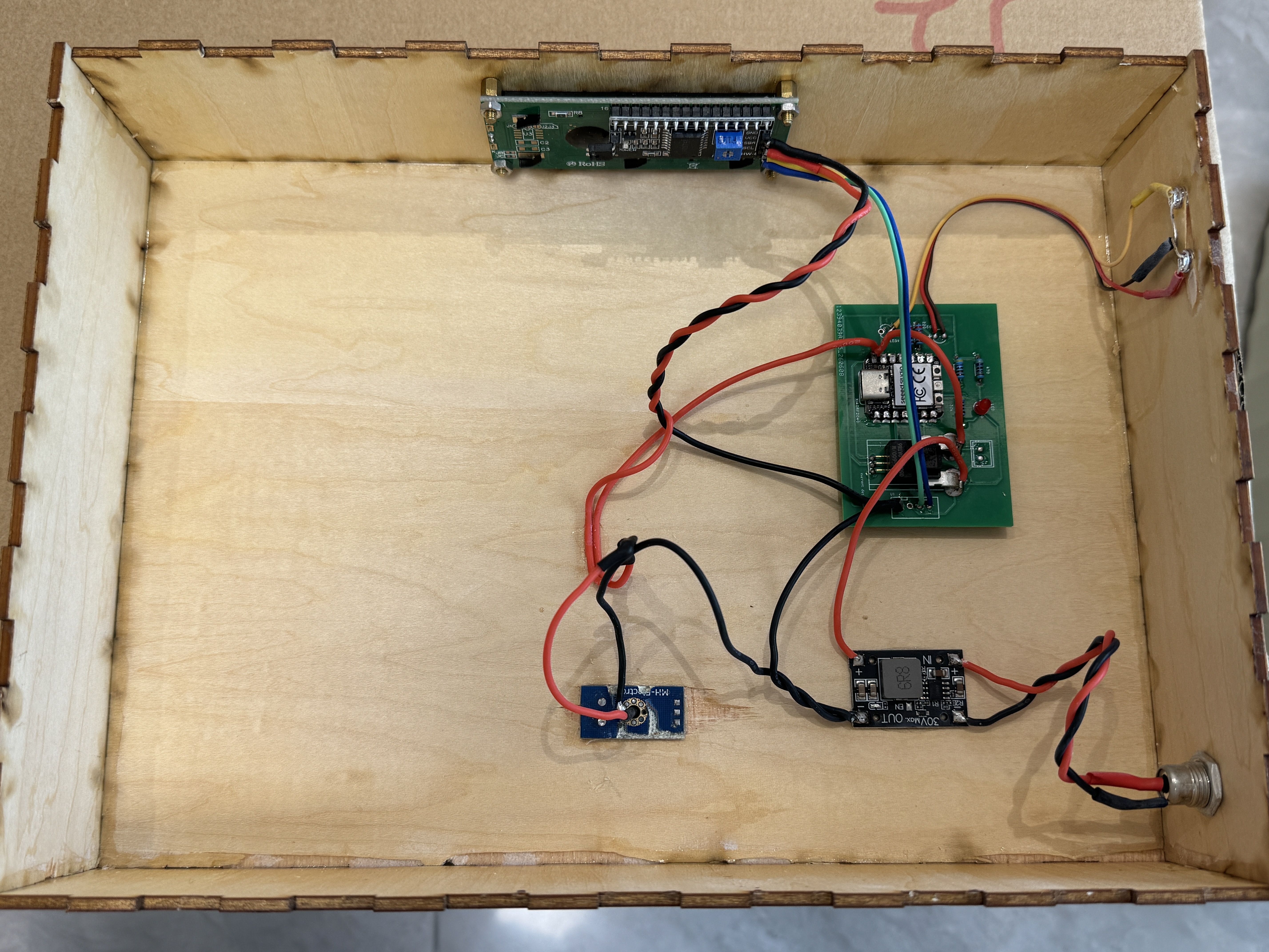 Rear wiring of the charging dock showing sensor and power connections