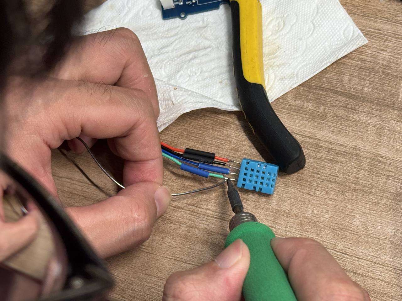 DHT11 humidity sensor soldered on the custom PCB