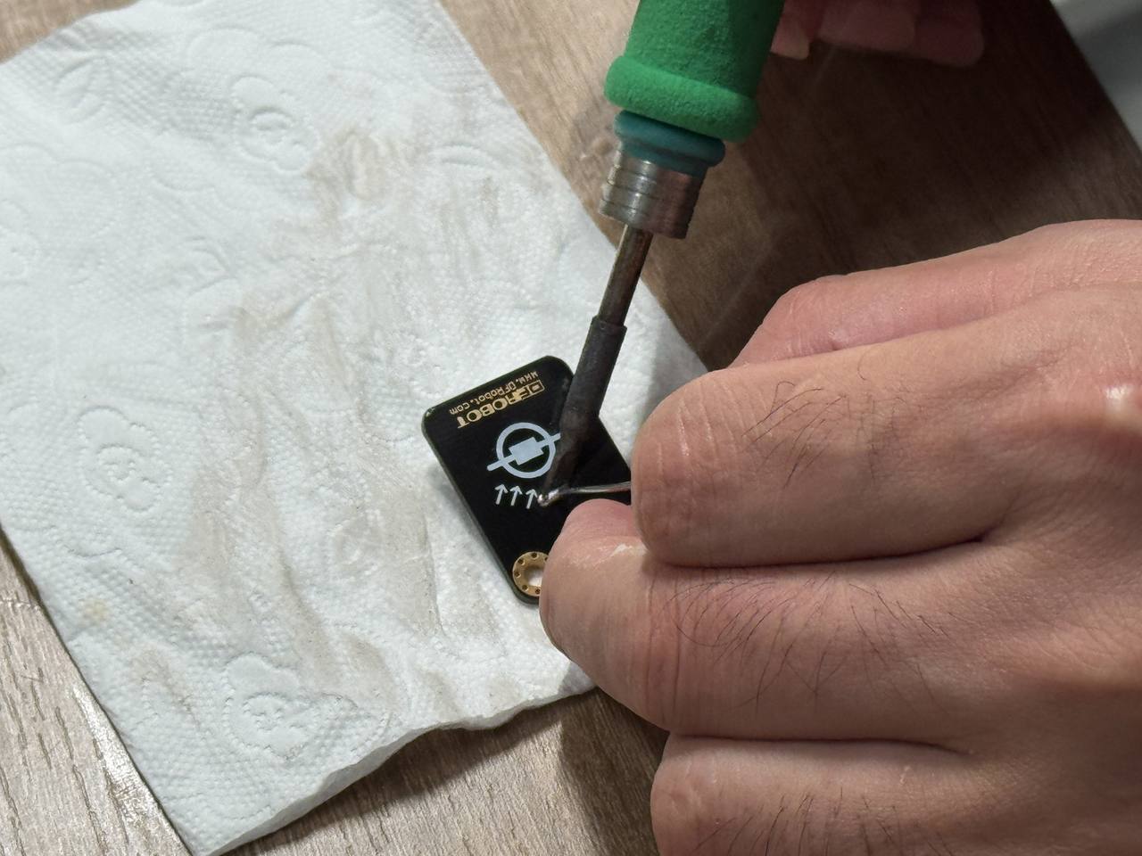 Close-up of light sensor soldered to the PCB pads