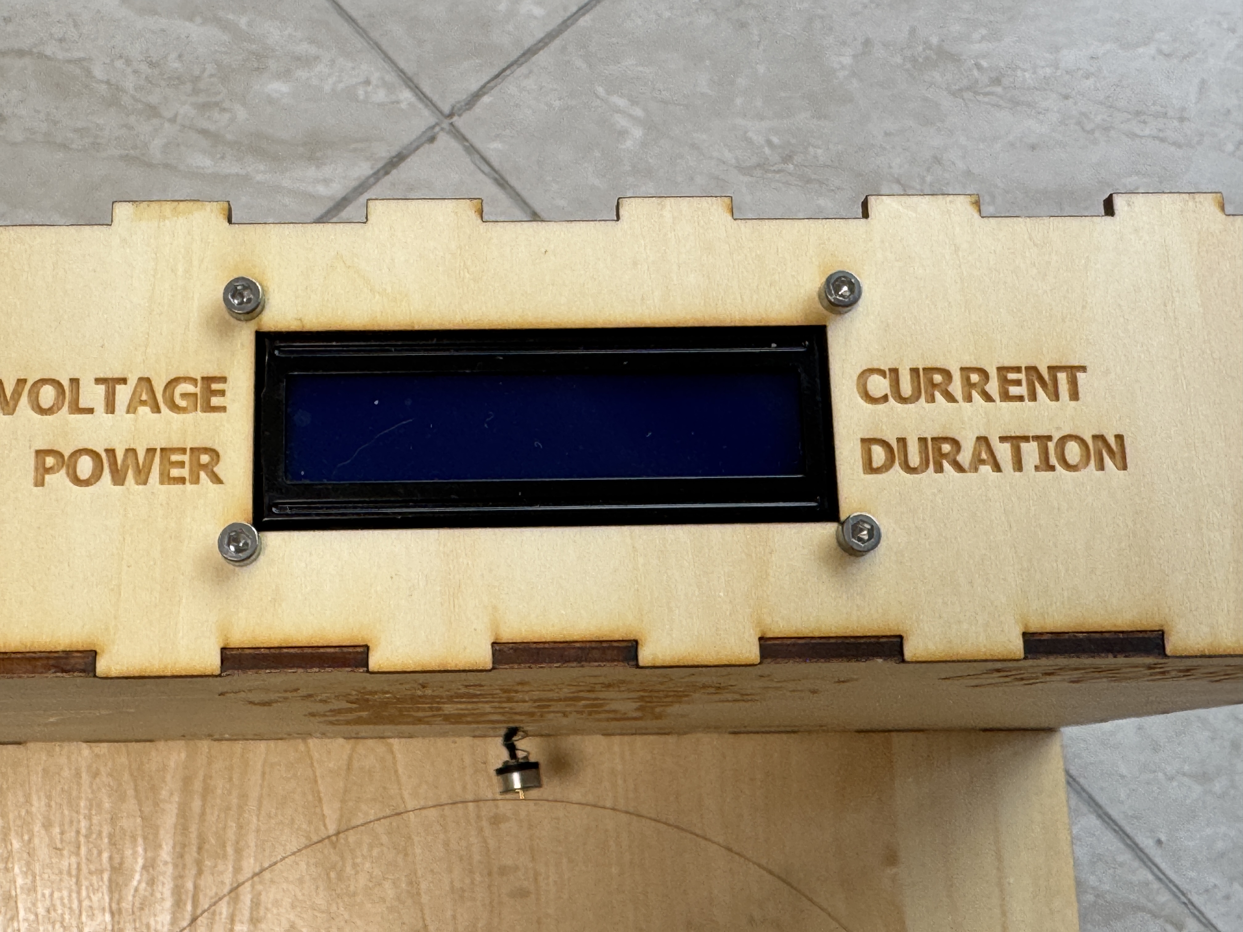 Close-up of 1602 LCD placement on the charging dock enclosure