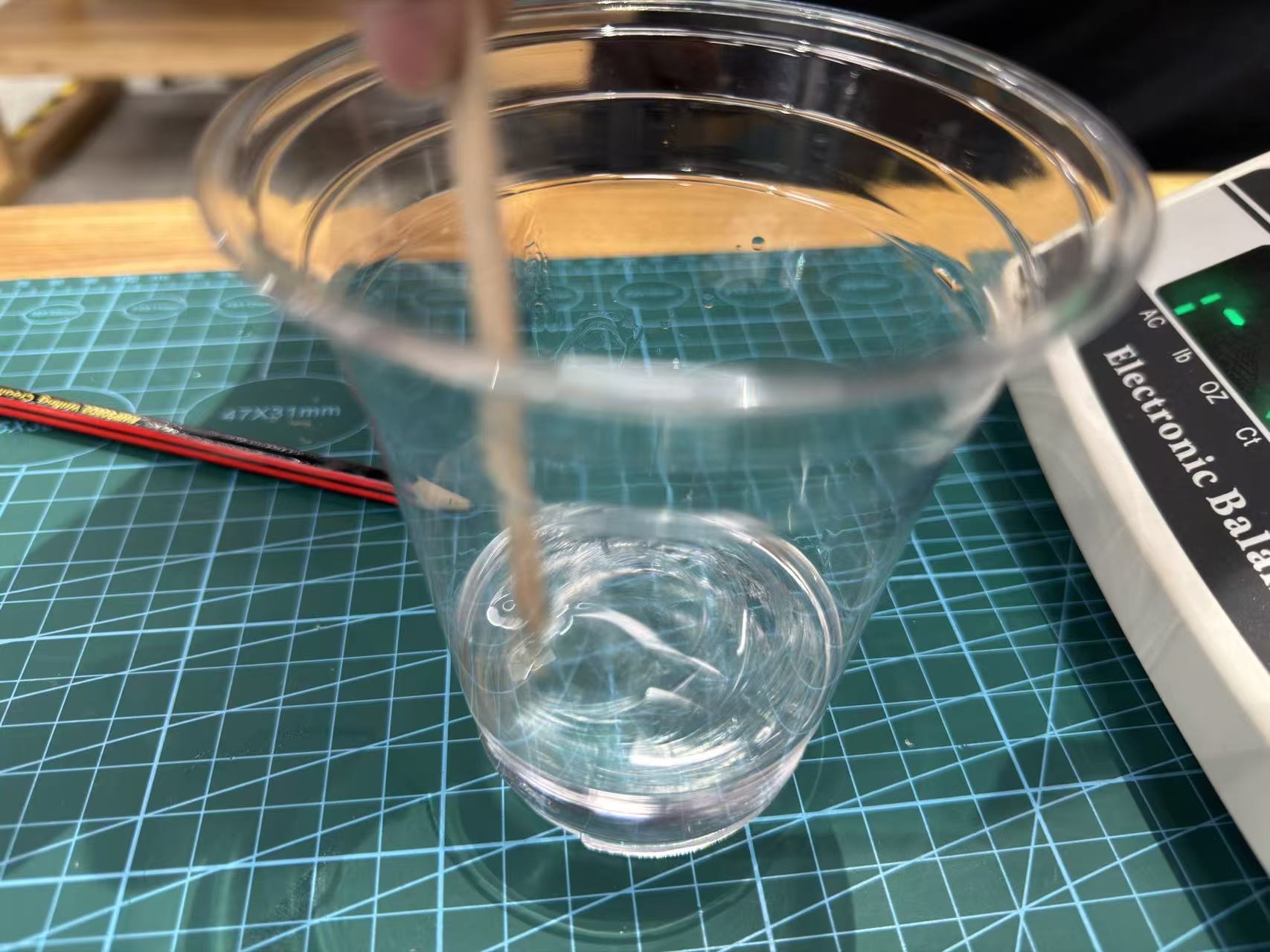 Stirring catalyzed epoxy in a mixing cup