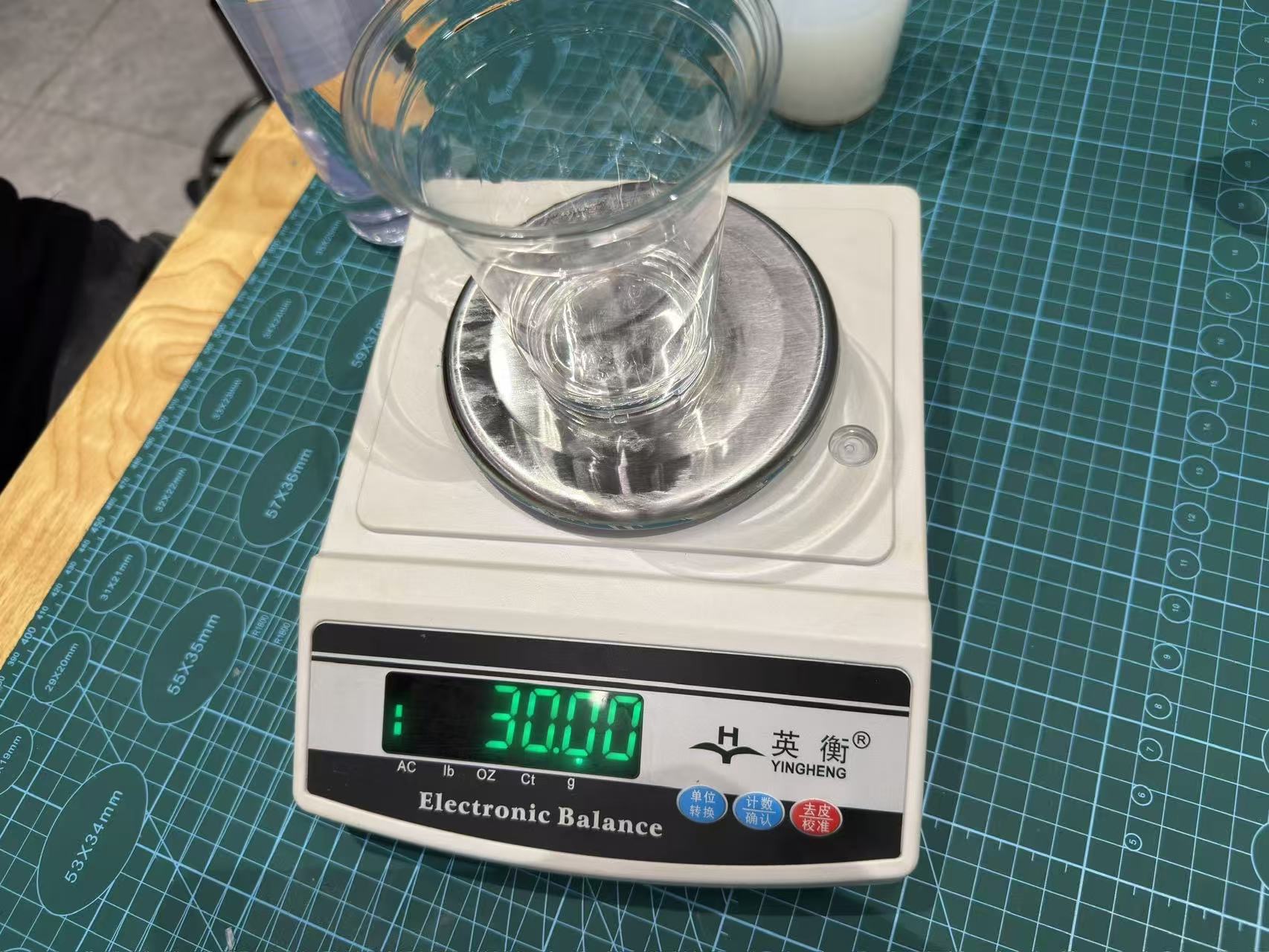 Weighing epoxy resin A and B on a scale
