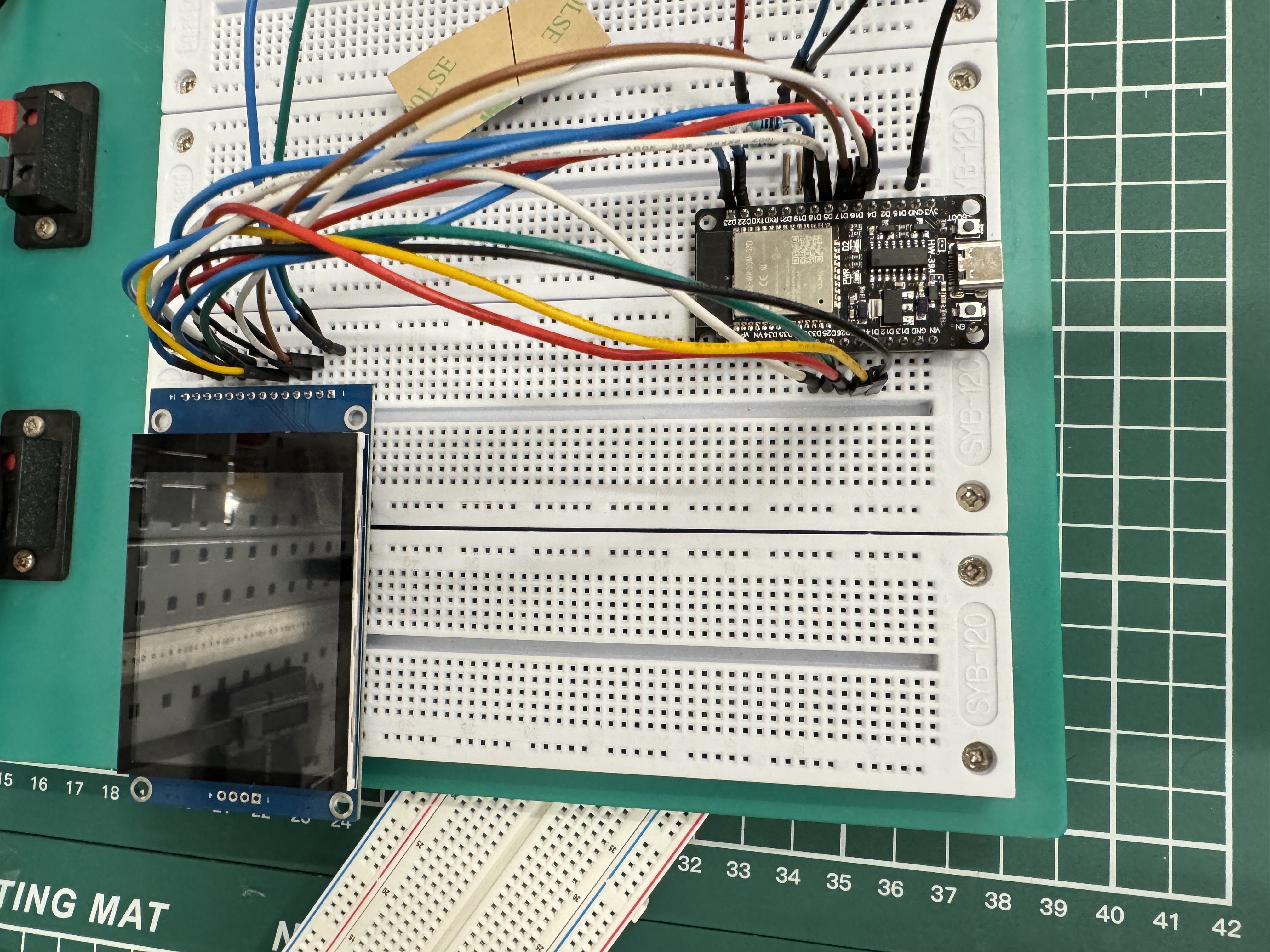 Breadboard wiring between ESP32 dev board and the TFT module