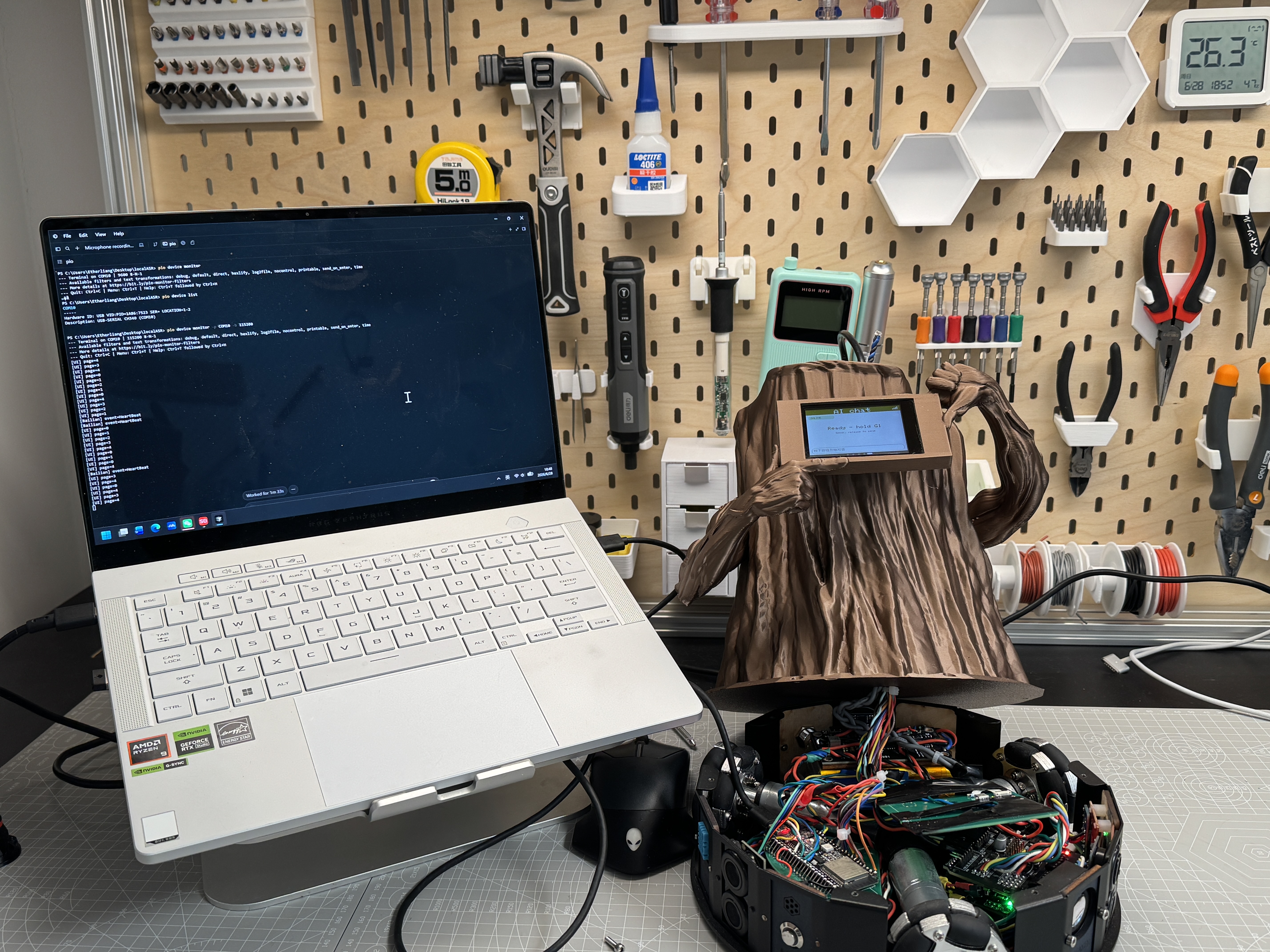 Computer serial monitor on the left and opened Forest Spirit electronics with TFT UI on the right