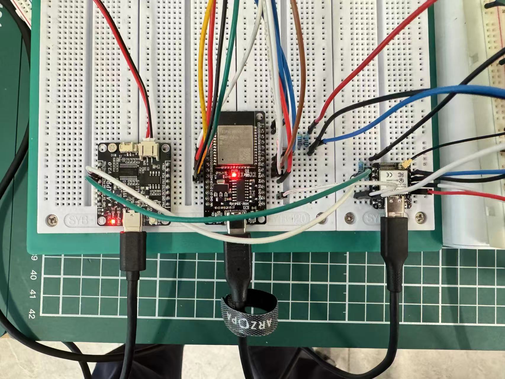 Breadboard with ASRPRO V2.0, ESP32 WROOM, and XIAO ESP32-S3 wired for voice mailbox bring-up