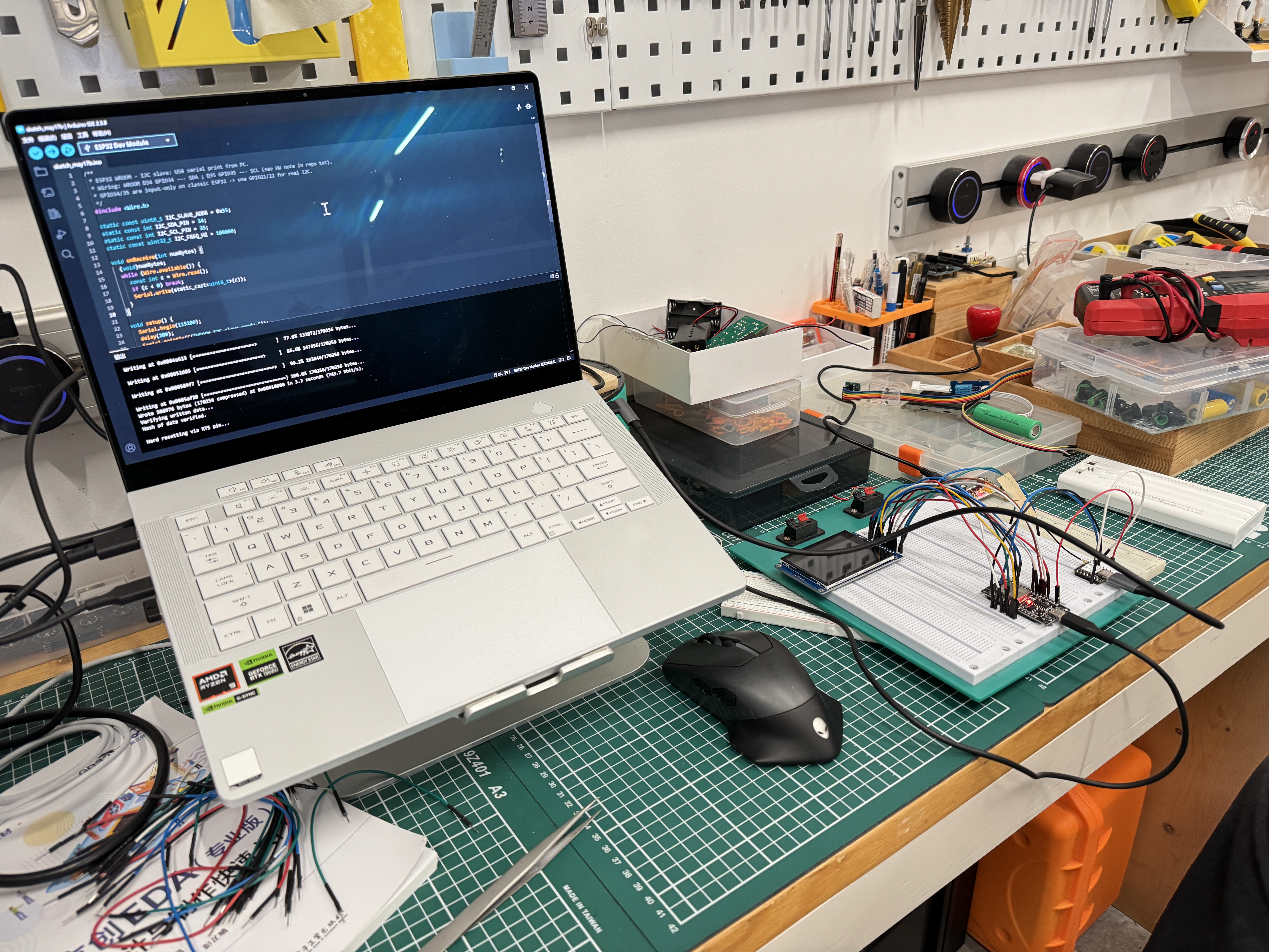 Computer screen showing Arduino-style source code edited in Cursor with syntax highlighting