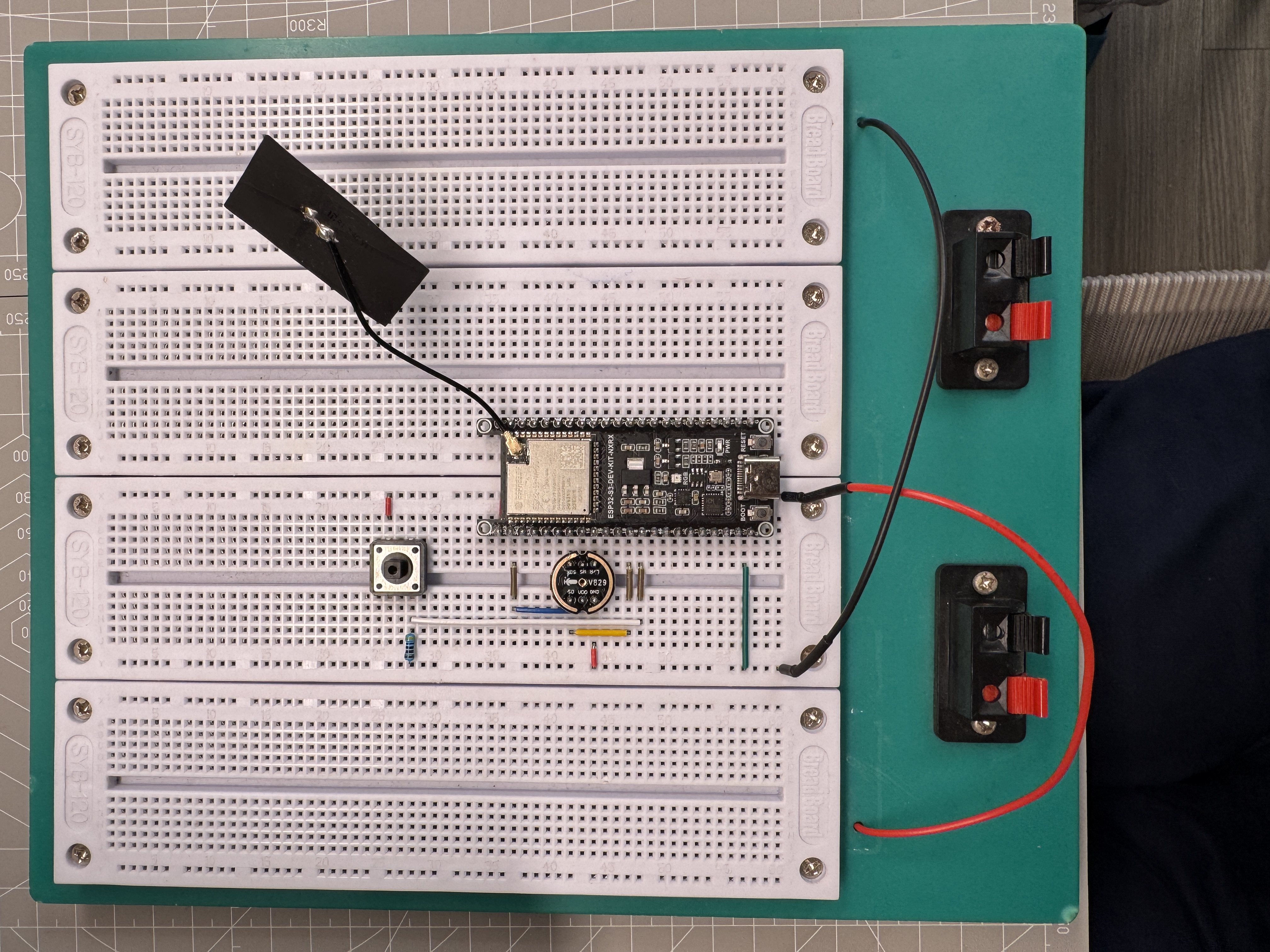 ESP32-S3-WROOM bench setup with I2S microphone module and push-to-talk button for local speech command recognition