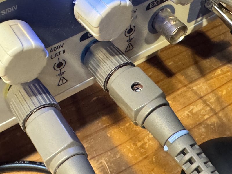 screw hole for adjusting wave form