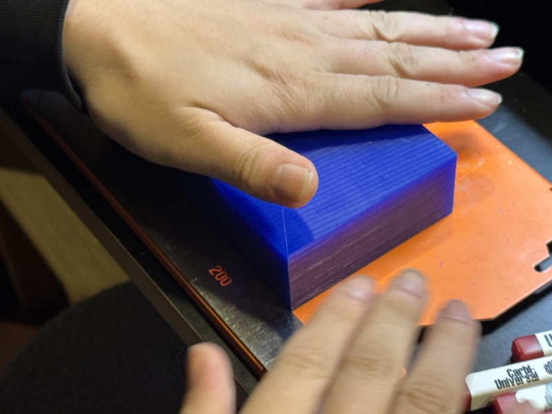 push to stick against the base