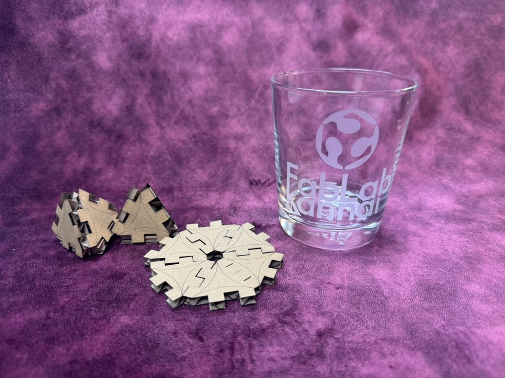 Finished sandblasted glass with FabLab Kannai logo