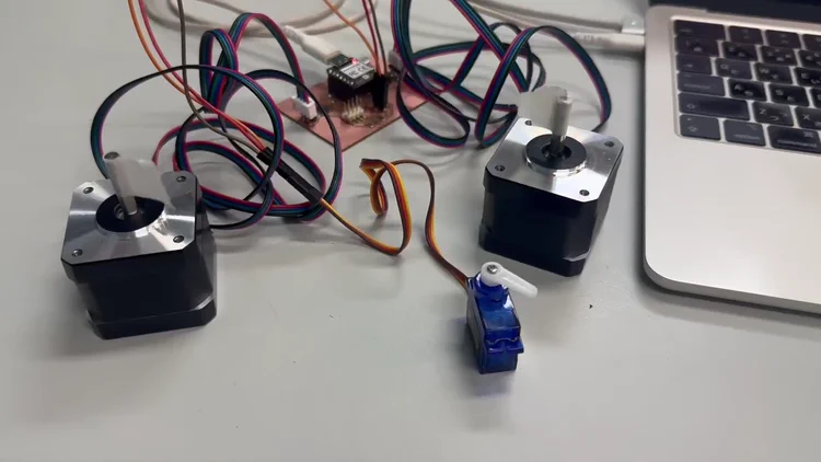 Two stepper motors and servo running simultaneously