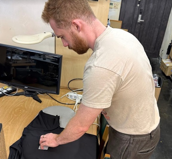 Because the polyester shirt I was using was very thin I also needed to iron on a fusible backing to the T-shirt to ensure the needle didn't tear through the fabric and keep things stable while embroidering
