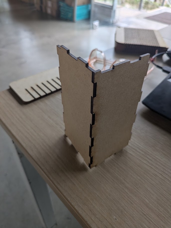 Not bad for the very first thing I laser cut. The fit was a tad bit loose - so I adjusted the kerf to cut a little bit less from the fingers and more from the slots.