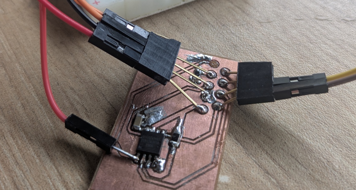 Exhibit A - you'll notice a solder pad completely missing in the back there. Yep don't mind me trying to fix it with by just soldering a dupont wire directly to the chip instead