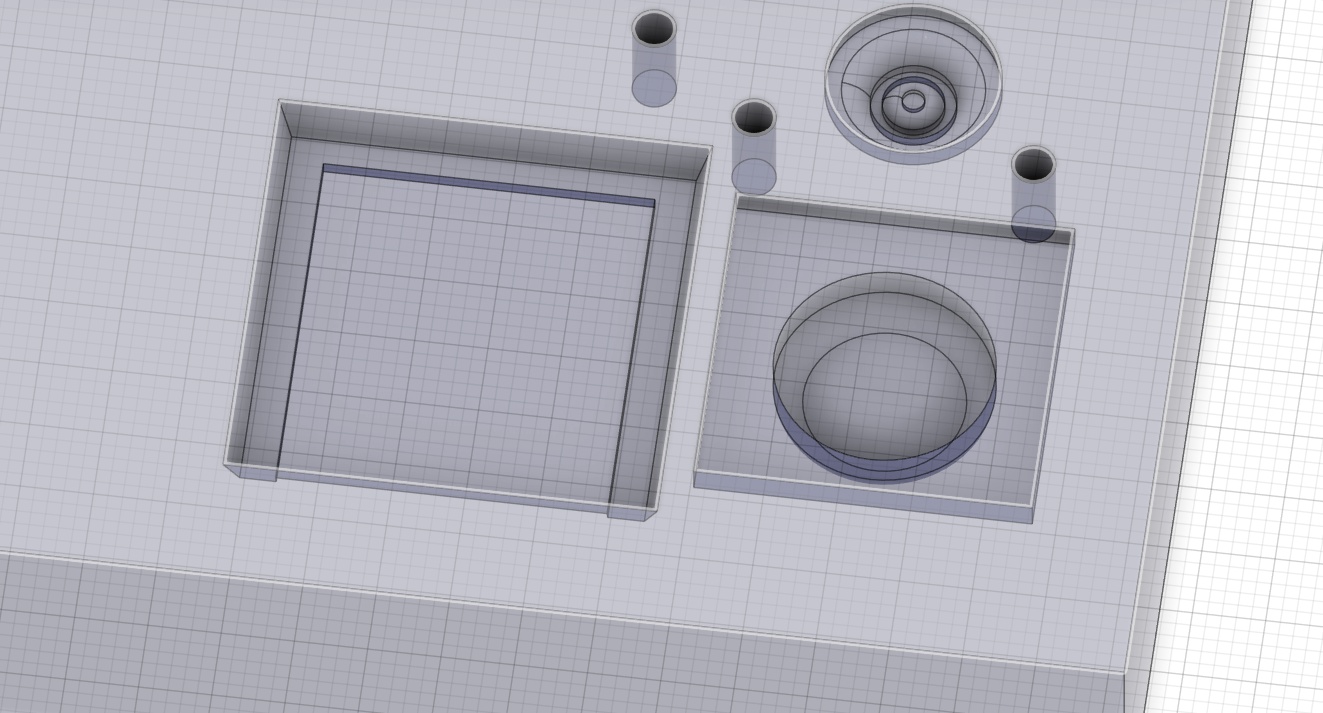 Here are the two wax negatives that the button positive halves will sit inside